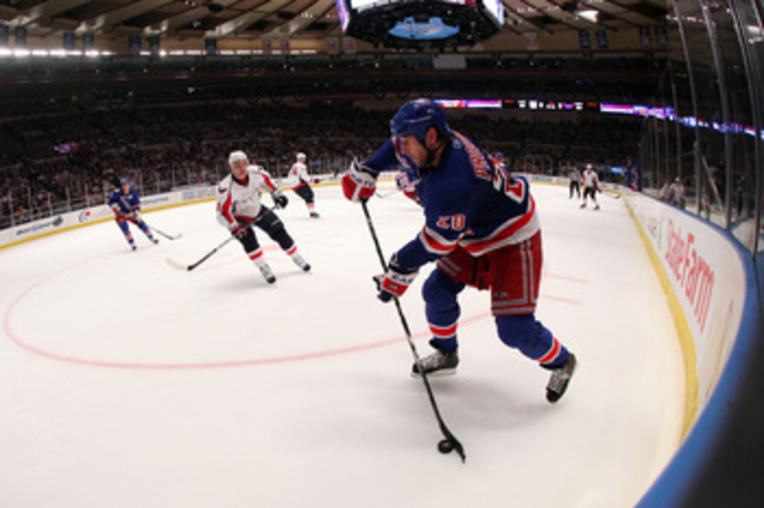 NEW YORK, NY - APRIL 20:  Vaclav Prospal #20 of the New York Rangers moves the puck against the Washington Capitals in Game Four of the Eastern Conference Quarterfinals during the 2011 NHL Stanley Cup Playoffs at Madison Square Garden on April 20, 2011 in