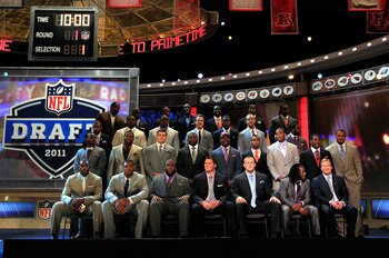NEW YORK, NY - APRIL 28:  NFL Commissioner Roger Goodell (botom row R) poses for a photo on stage with the members of the 2011 Draft class and the 2011 Pro Football Hall of Fame class during the 2011 NFL Draft at Radio City Music Hall on April 28, 2011 in