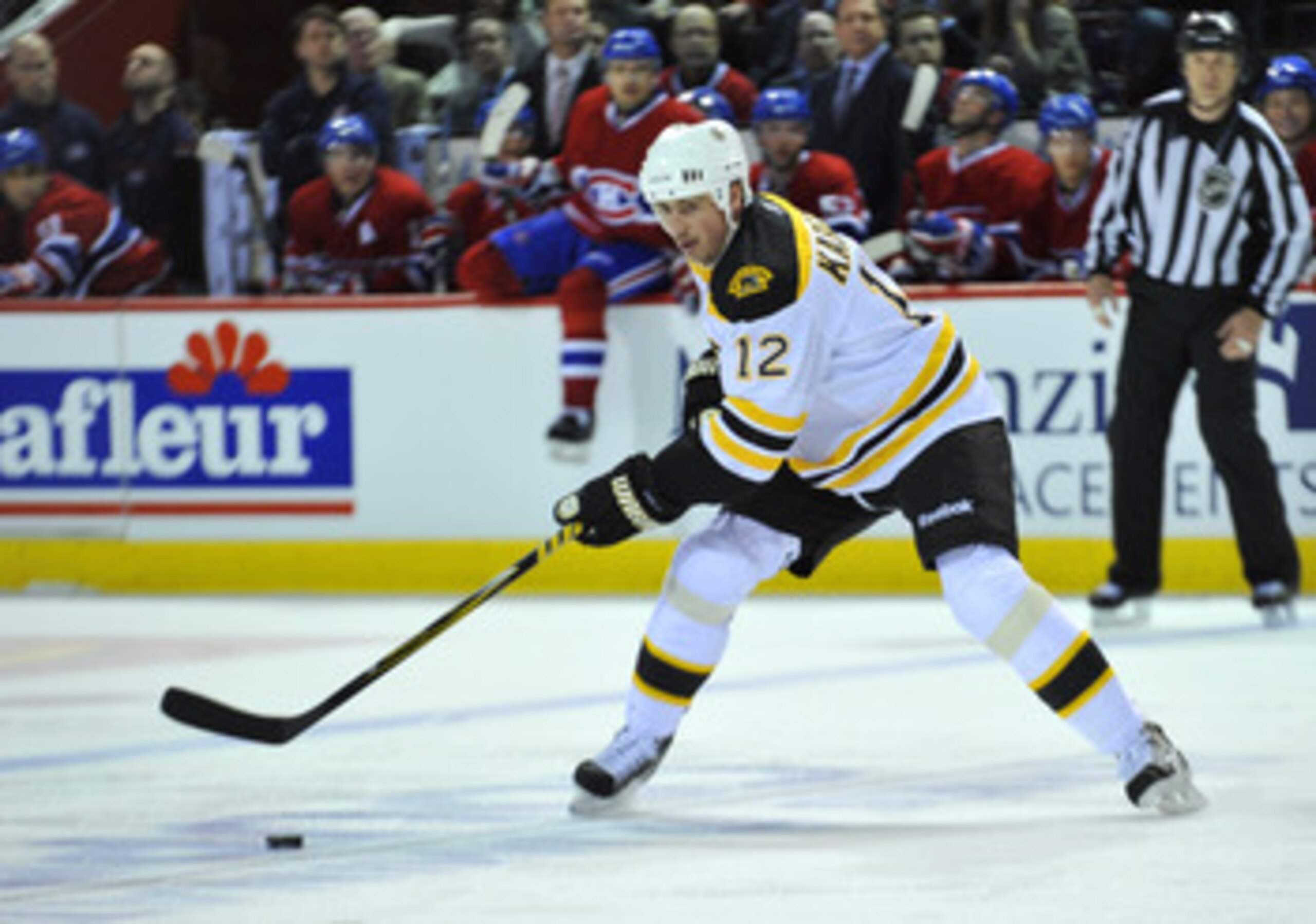 MONTREAL, CANADA - APRIL 18:  Tomas Kaberle #12 of the Boston Bruins controls the puck at the blueline in Game Three of the Eastern Conference Quarterfinals against the Montreal Canadiens during the 2011 NHL Stanley Cup Playoffs at the Bell Centre on Apri