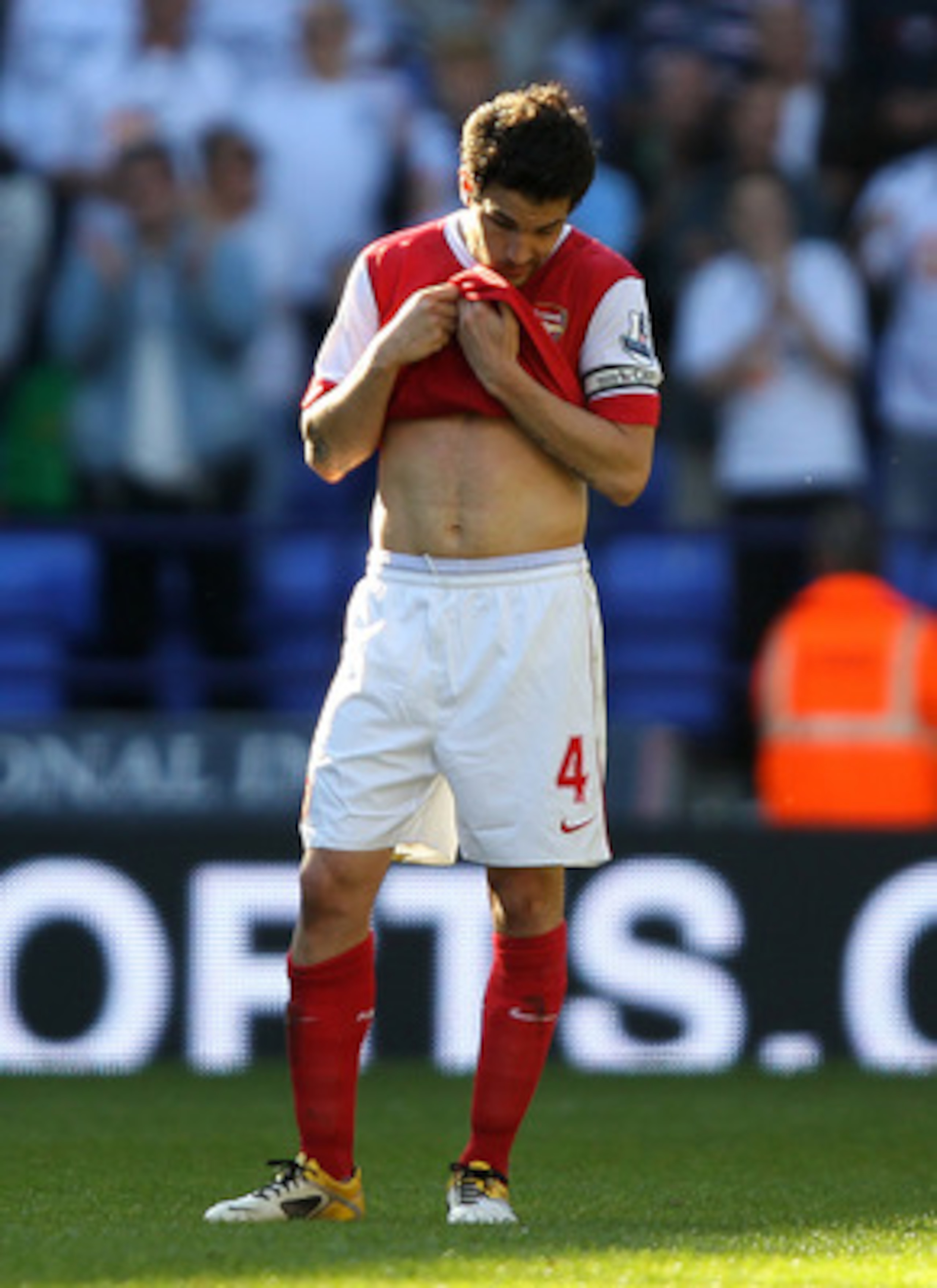 BOLTON, ENGLAND - APRIL 24:  Cesc Fabregas of Arsenal looks dejected during the Barclays Premier League match between Bolton Wanderers and Arsenal at the Reebok Stadium on April 24, 2011 in Bolton, England.  (Photo by Clive Brunskill/Getty Images)
