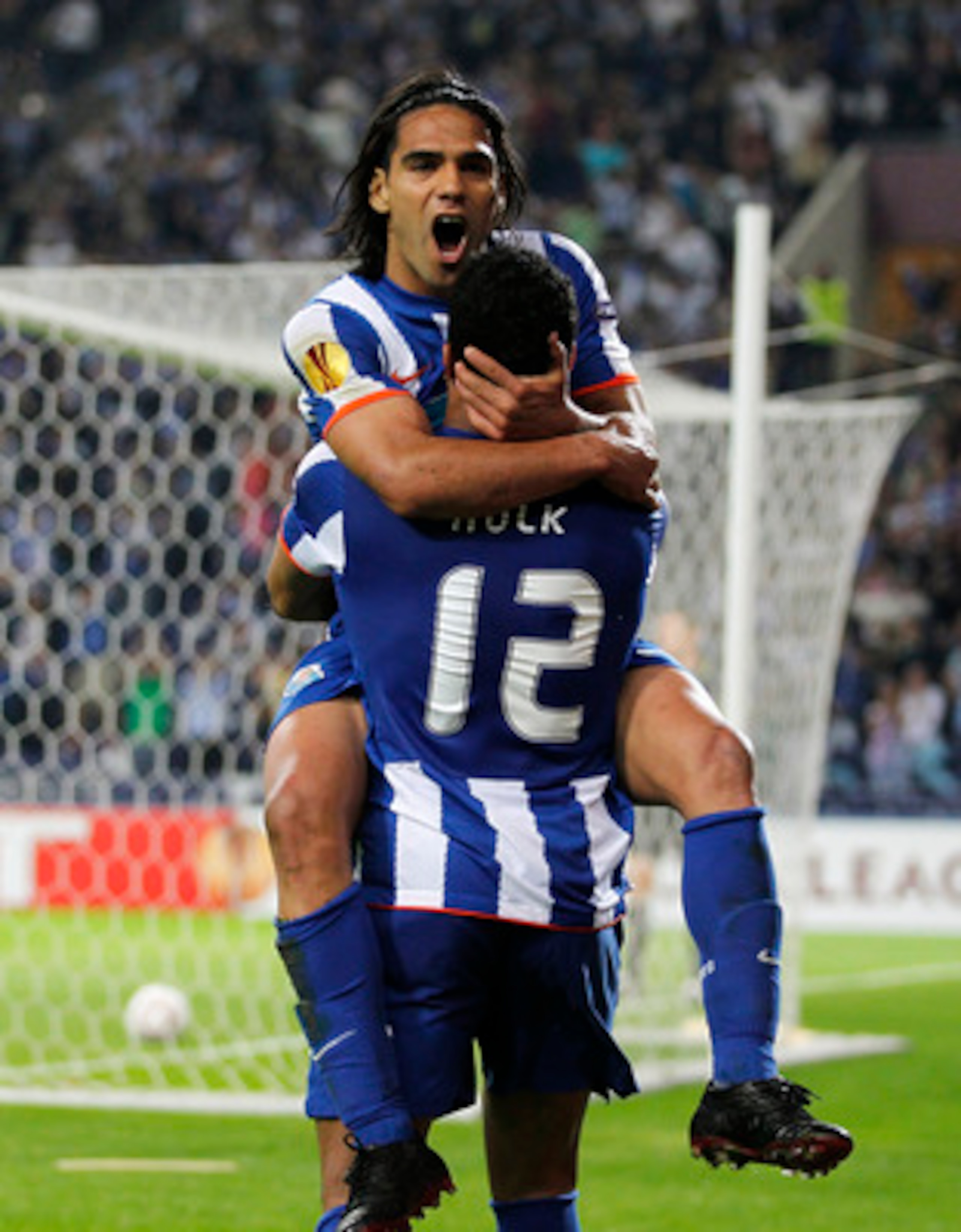PORTO, PORTUGAL - APRIL 28:  Radamel Falcao of FC Porto celebrates with Givalnildo Vieira 'Hulk' after scoring his side third goal during the UEFA Europa League semi final first leg match between FC Porto and Villarreal at Estadio do Dragao on April 28, 2