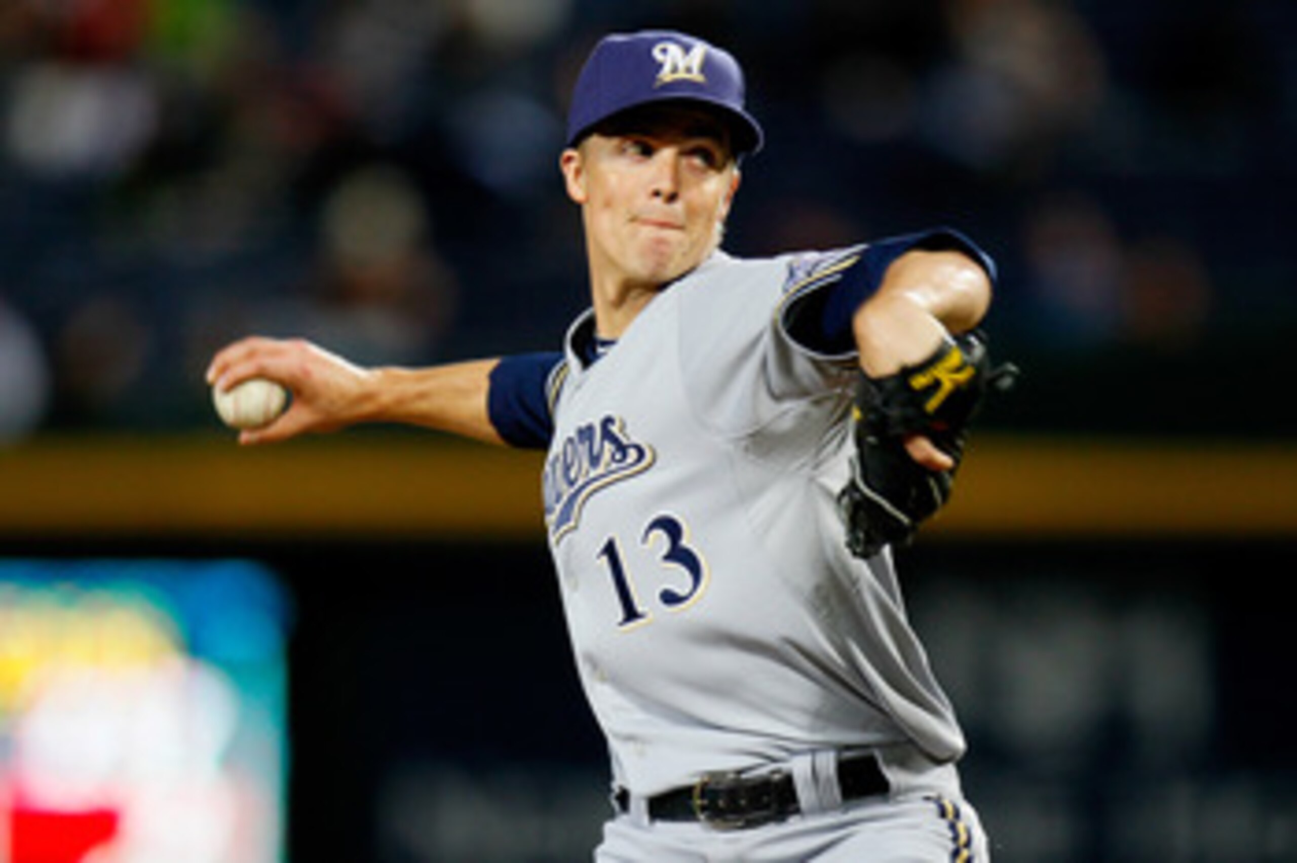 ATLANTA, GA - MAY 04:  Zack Greinke #13 of the Milwaukee Brewers pitches in the second inning against the Atlanta Braves at Turner Field on May 4, 2011 in Atlanta, Georgia.  (Photo by Kevin C. Cox/Getty Images)