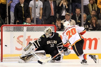 DALLAS, TX - MARCH 09: Left wing Curtis Glencross #20 of the Calgary Flames scores the game winning goal in the shootout against Kari Lehtonen #32 of the Dallas Stars at American Airlines Center on March 9, 2011 in Dallas, Texas. (Photo by Ronald Martin DALLAS, TX - MARCH 09: Left wing Curtis Glencross #20 of the Calgary Flames scores the game winning goal in the shootout against Kari Lehtonen #32 of the Dallas Stars at American Airlines Center on March 9, 2011 in Dallas, Texas. (Photo by Ronald Martin