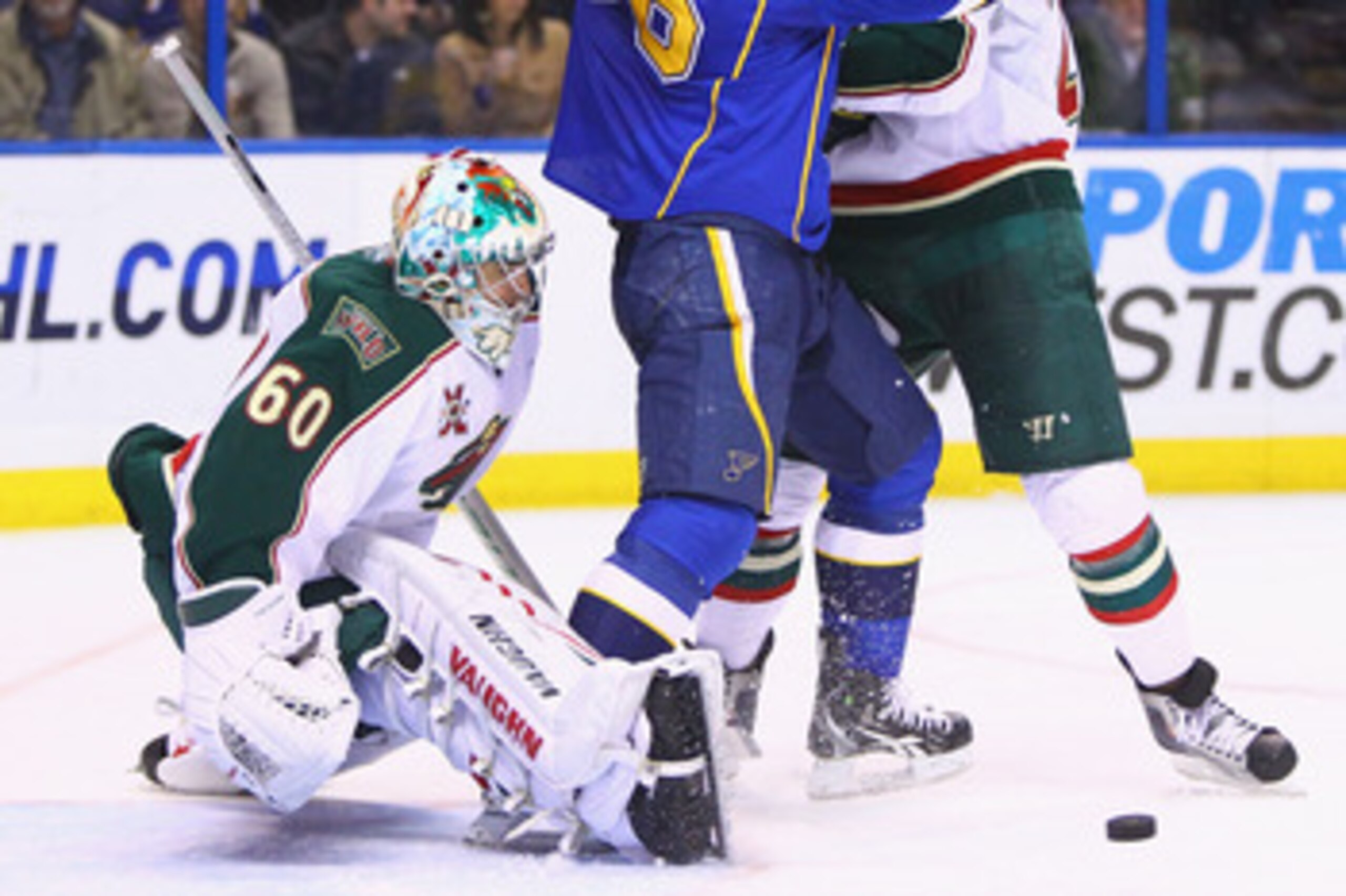 ST. LOUIS, MO - FEBRUARY 11: Jose Theodore #60 of the Minnesota Wild makes a save against the St. Louis Blues at the Scottrade Center on February 11, 2011 in St. Louis, Missouri.  The Wild won 5-4 in a shootout.  (Photo by Dilip Vishwanat/Getty Images)