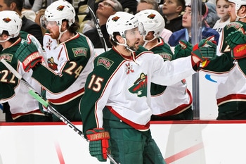 PITTSBURGH, PA - JANUARY 08: Andrew Brunette #15 of the Minnesota Wild is congratulated after assisting on a goal against the Pittsburgh Penguins on January 8, 2011 at CONSOL Energy Center in Pittsburgh, Pennsylvania. (Photo by Jamie Sabau/Getty Images) PITTSBURGH, PA - JANUARY 08: Andrew Brunette #15 of the Minnesota Wild is congratulated after assisting on a goal against the Pittsburgh Penguins on January 8, 2011 at CONSOL Energy Center in Pittsburgh, Pennsylvania. (Photo by Jamie Sabau/Getty Images)