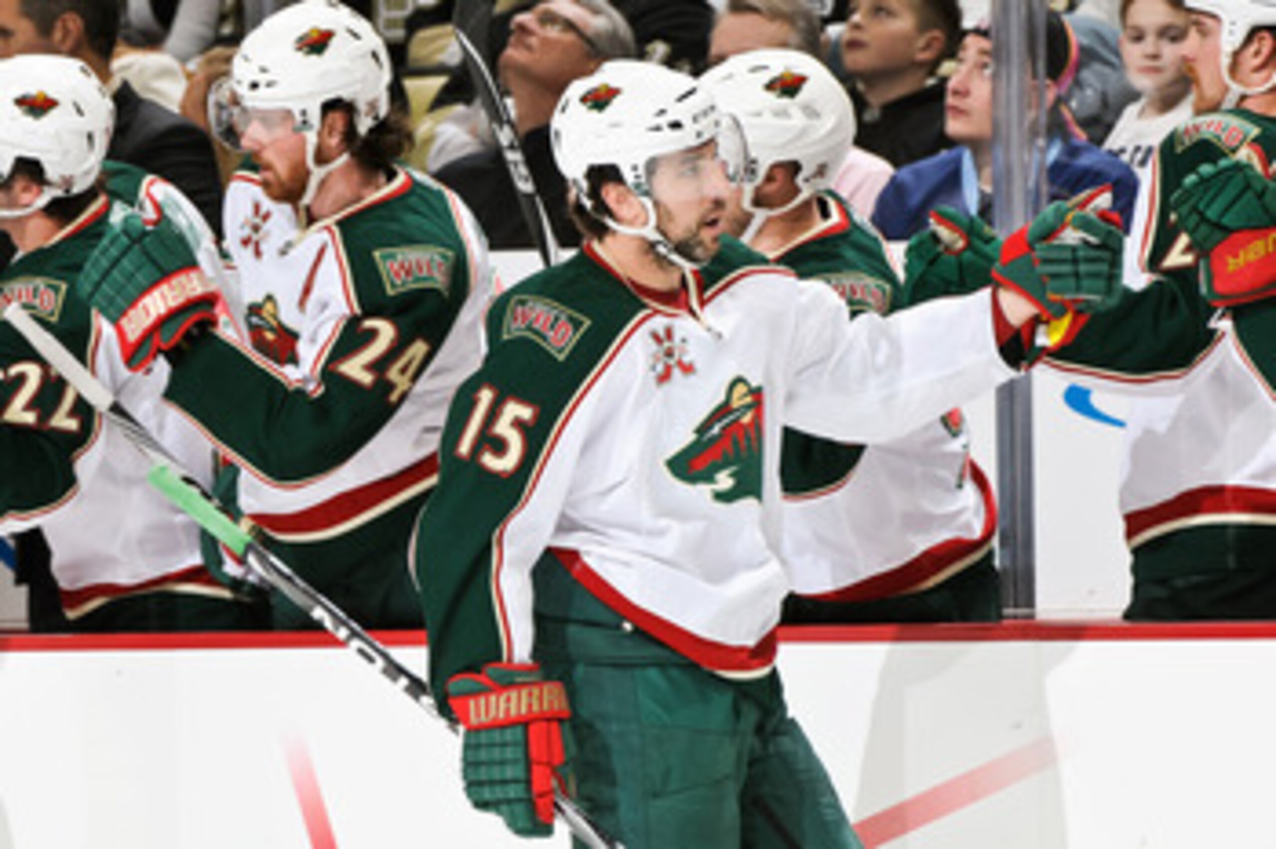 PITTSBURGH, PA - JANUARY 08:  Andrew Brunette #15 of the Minnesota Wild is congratulated after assisting on a goal against the Pittsburgh Penguins on January 8, 2011 at CONSOL Energy Center in Pittsburgh, Pennsylvania.  (Photo by Jamie Sabau/Getty Images)