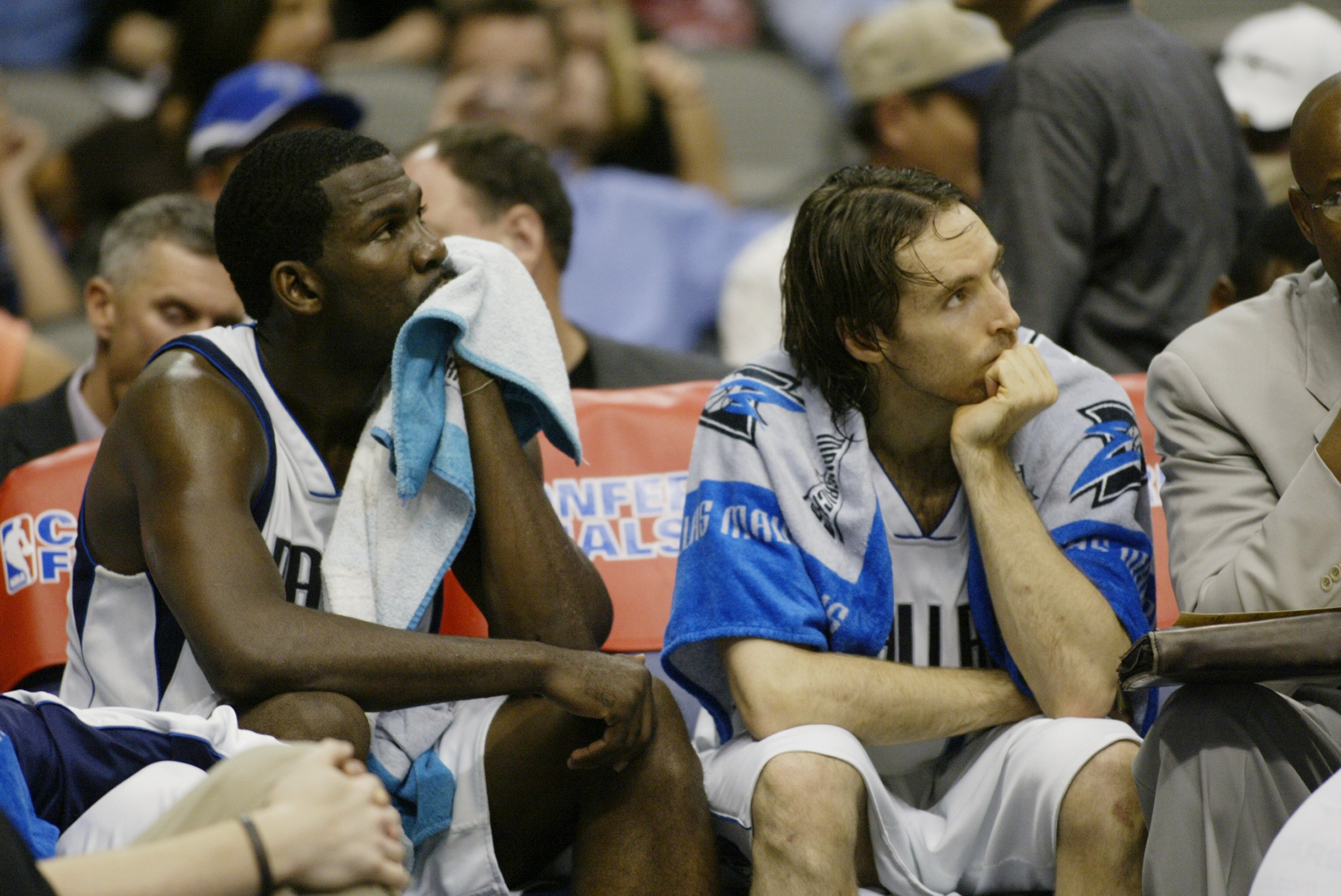 DALLAS - MAY 23:  (Left to Right) Michael Finley #4 and Steve Nash #13 of the Dallas Mavericks watch Game three of the Western Conference Finals against the San Antonio Spurs during the 2003 NBA Playoffs at American Airlines Center on May 23, 2003 in Dall