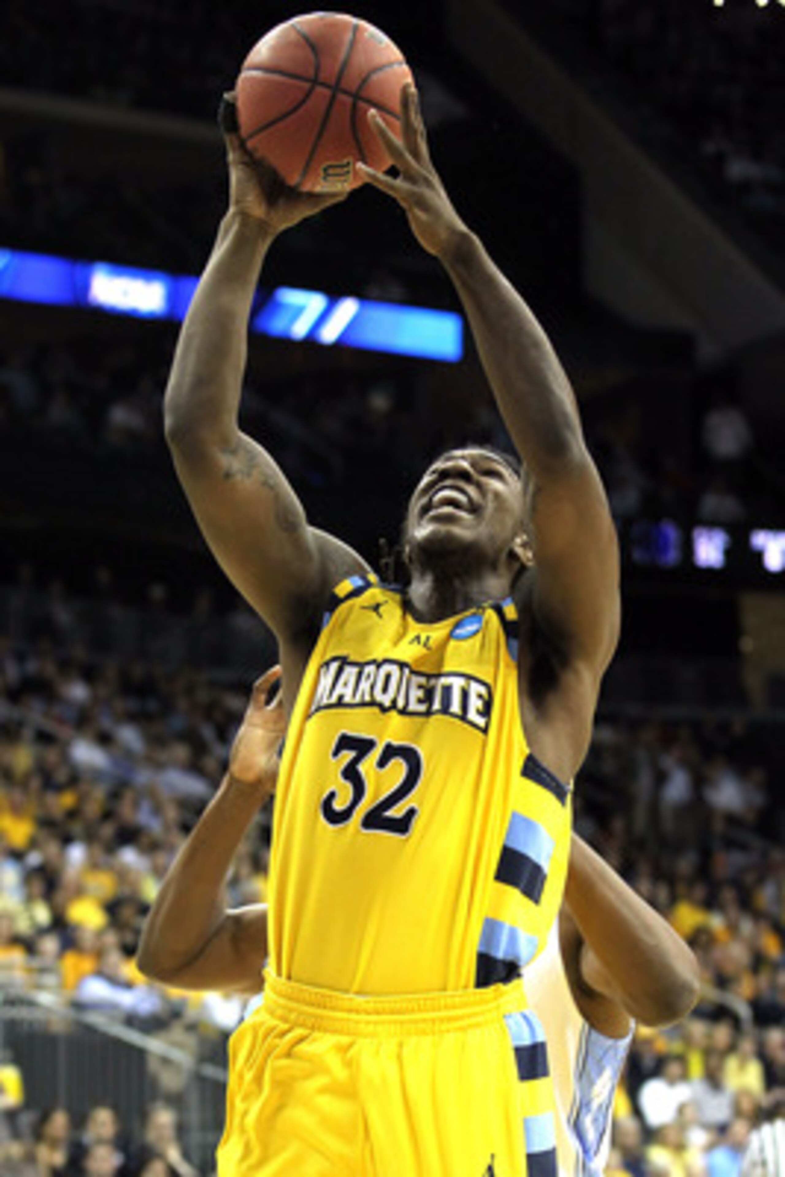 NEWARK, NJ - MARCH 25:  Jae Crowder #32 of the Marquette Golden Eagles in action against the North Carolina Tar Heels during the east regional semifinal of the 2011 NCAA Men's Basketball Tournament at the Prudential Center on March 25, 2011 in Newark, New