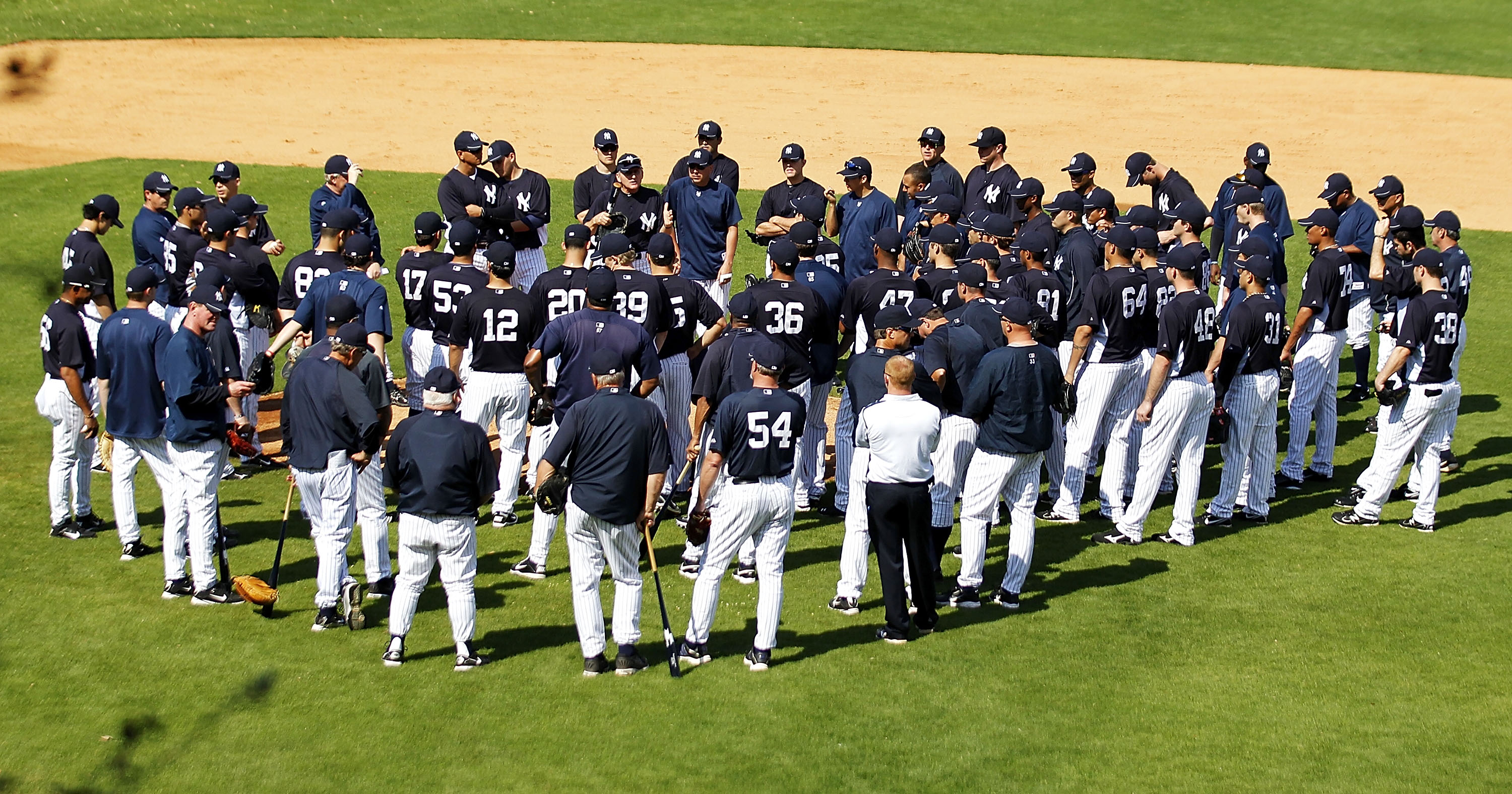 TAMPA, FL - FEBRUARY 21: New York Yankees coach Mick Kelleher #50 talks with the team prior to the start of the second day of full teams workouts at Spring Training on February 21, 2011 at the George M. Steinbrenner Field in Tampa, Florida.  (Photo by Leo
