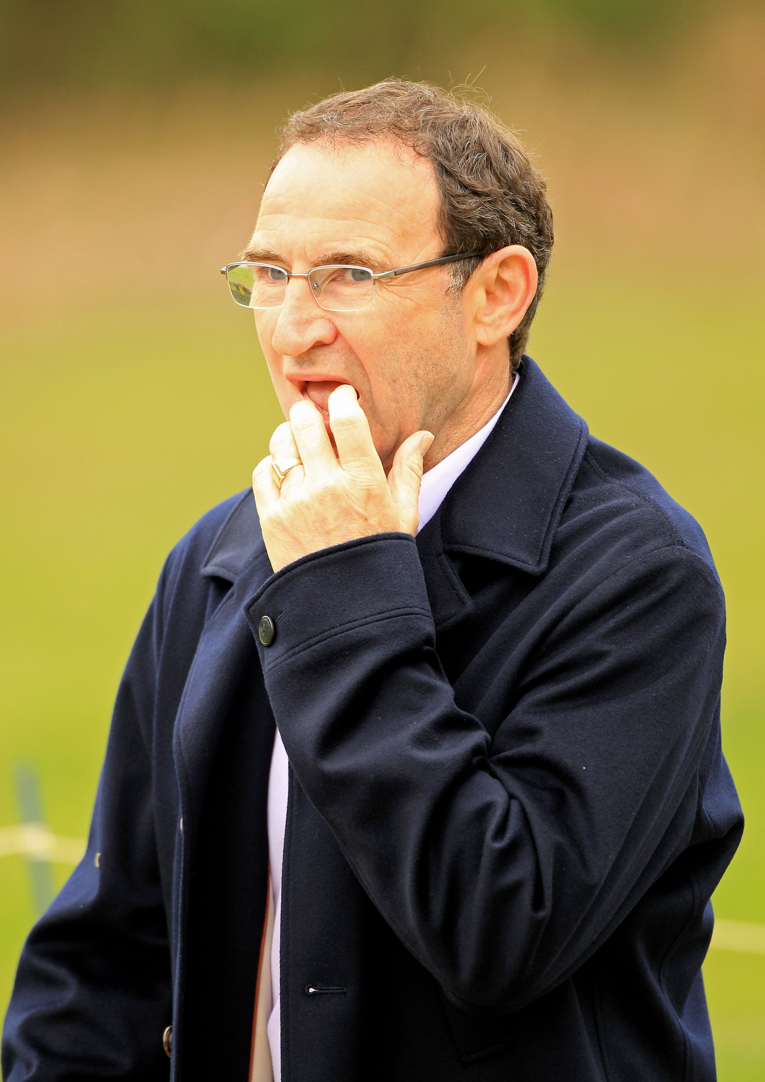 VIRGINIA WATER, ENGLAND - MAY 20:  Aston Villa Manager Martin O'Neill walks down the 5th hole during the first round of the BMW PGA Championship on the West Course at Wentworth on May 20, 2010 in Virginia Water, England.  (Photo by Warren Little/Getty Ima