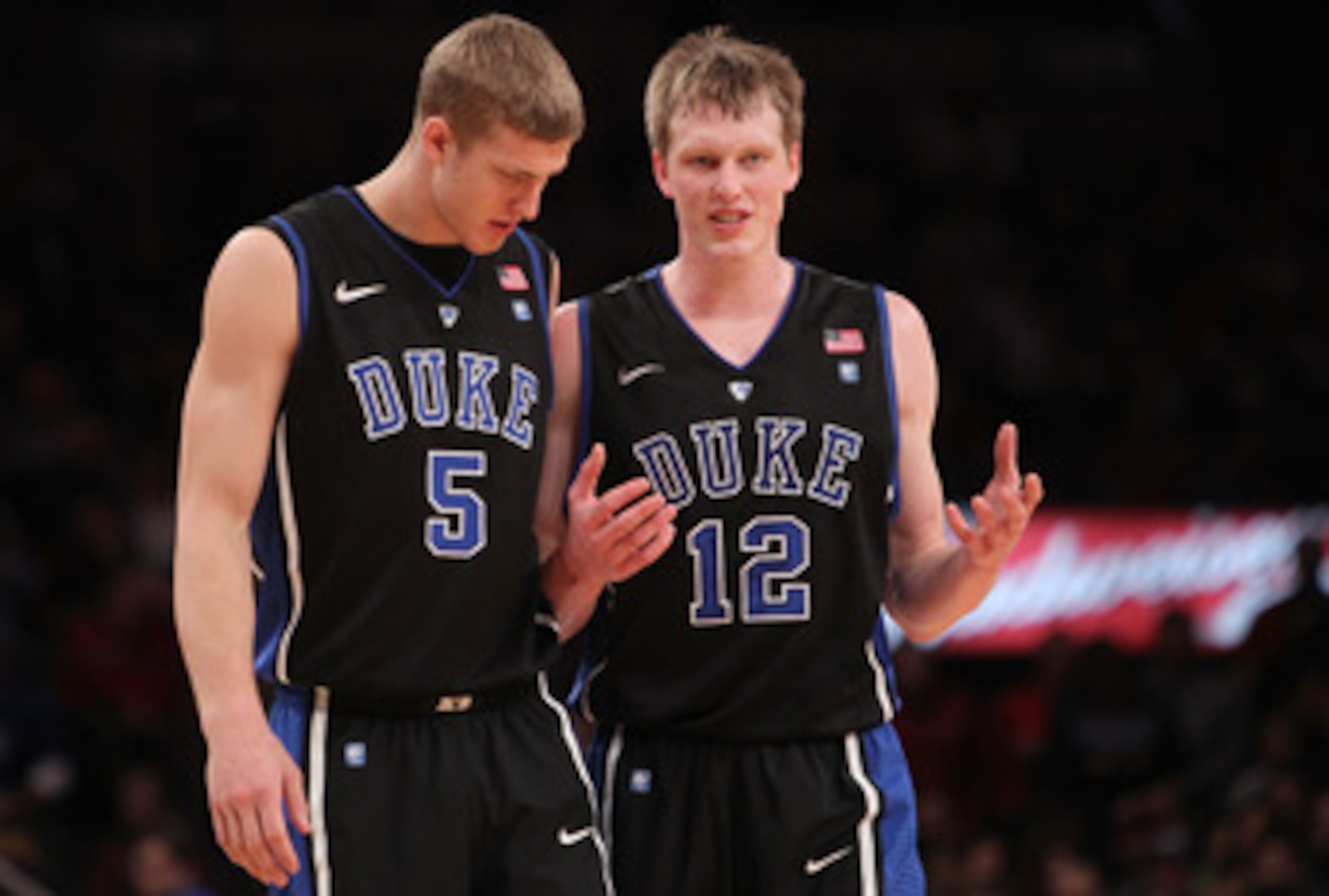 NEW YORK, NY - JANUARY 30: Mason Plumlee #5 of the Duke Blue Devils talks to teammate Kyle Singler #12 against the St John's Red Storm  at Madison Square Garden on January 30, 2011 in New York City.  (Photo by Nick Laham/Getty Images)