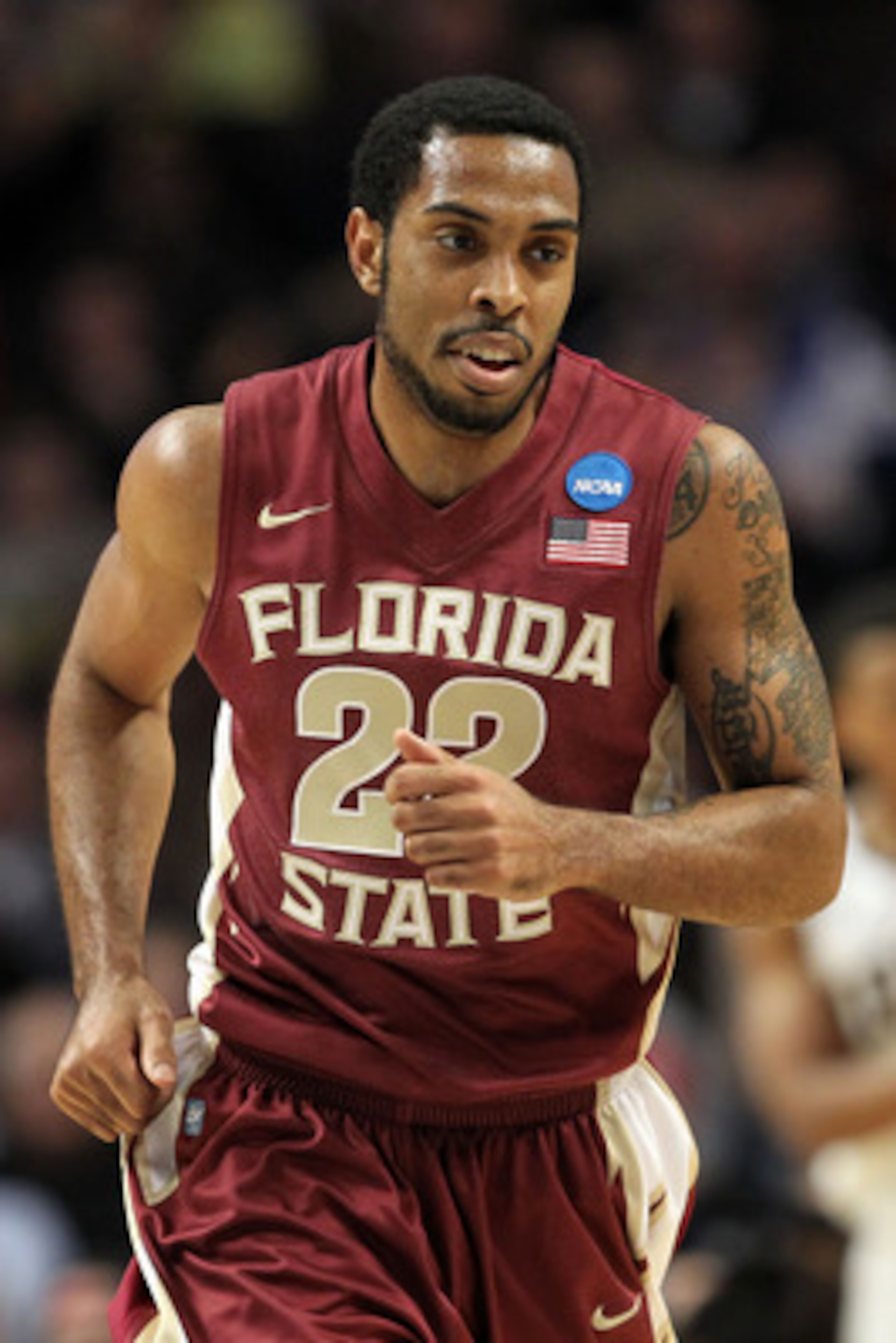 CHICAGO, IL - MARCH 20:  Derwin Kitchen #22 of the Florida State Seminoles runs up court in the first half against the Notre Dame Fighting Irish during the third round of the 2011 NCAA men's basketball tournament at the United Center on March 20, 2011 in 