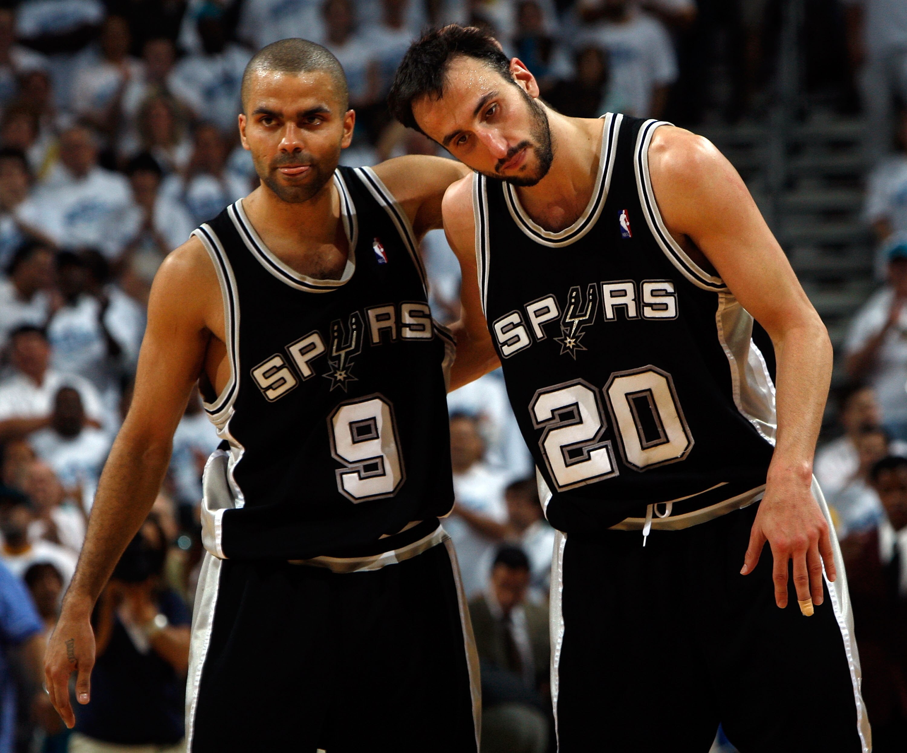 NEW ORLEANS - MAY 19:  Tony Parker #9 and Manu Ginobili #20 of the San Antonio Spurs celebrate after defeating the New Orleans Hornets 91-82 in Game Seven of the Western Conference Semifinals during the 2008 NBA Playoffs at The New Orleans Arena on May 19