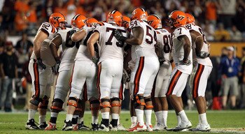 MIAMI, FL - JANUARY 03:  The Virginia Tech Hokies offense stands in the huddle against the Stanford Cardinal during the 2011 Discover Orange Bowl at Sun Life Stadium on January 3, 2011 in Miami, Florida. Stanford won 40-12. (Photo by Streeter Lecka/Getty
