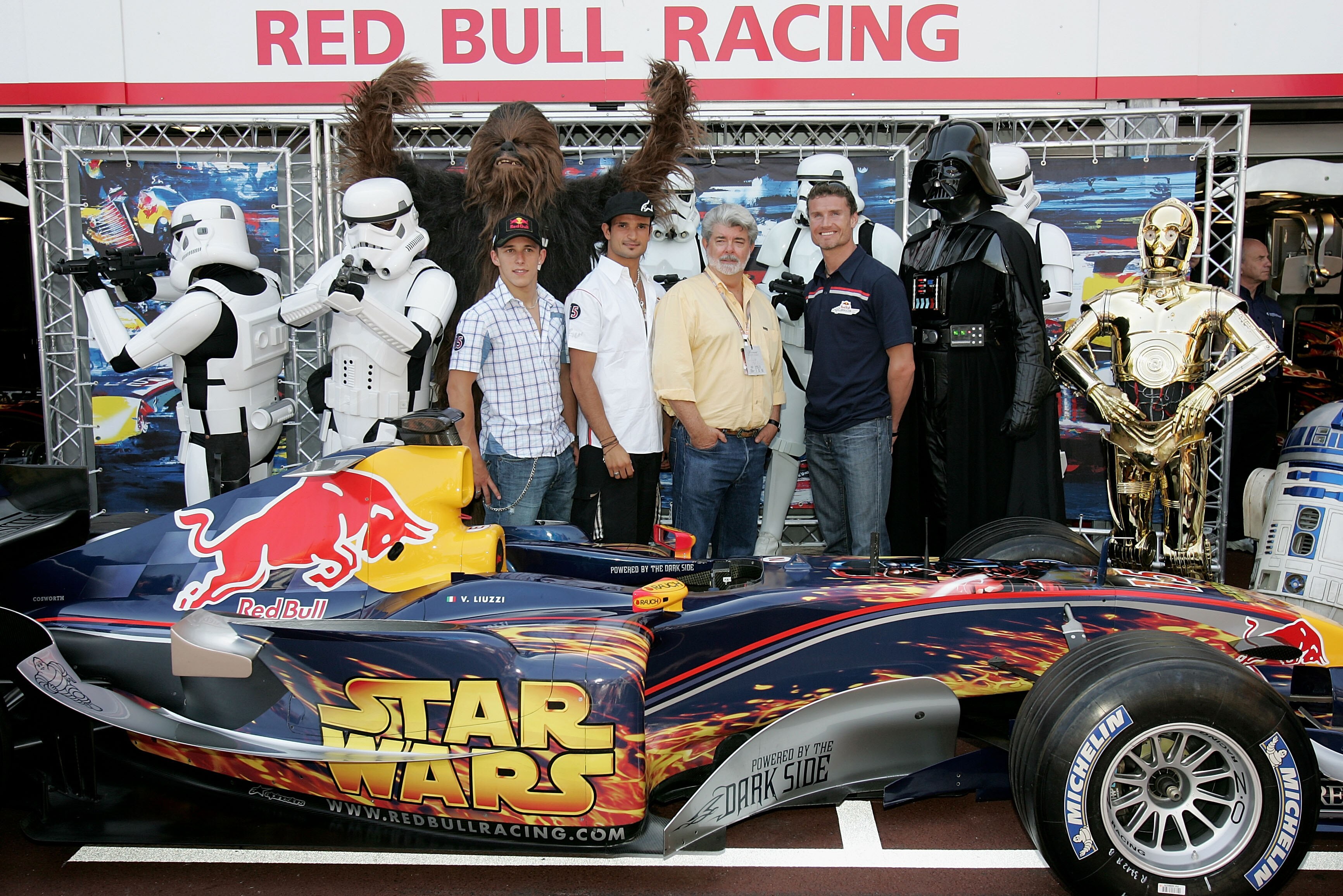 MONTE CARLO, MONACO - MAY 20:  Christian Klien of Austria and Red Bull (plaid shirt) and Vitantonio Liuzzi of Italy and Red Bull (white shirt) and David Coulthard of Great Britain (blue shirt) and Red Bull alongside Star Wars film director George Lucas (y