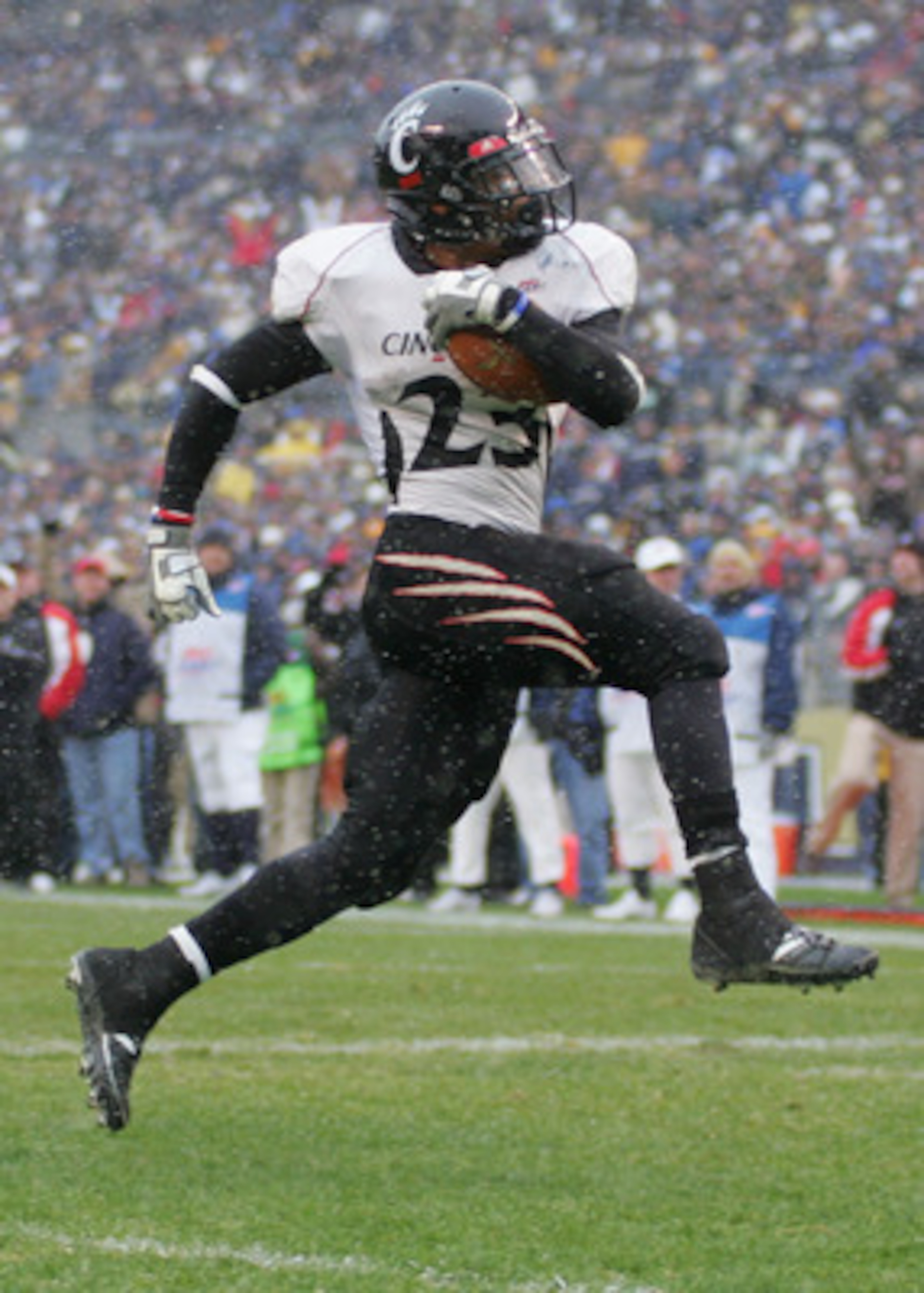 PITTSBURGH - DECEMBER 05:  Isaiah Pead #23 of the Cincinnati Bearcats scores a touchdown in the fourth quarter against the University of Pittsburgh Panthers on December 5, 2009 at Heinz Field in Pittsburgh, Pennsylvania.  (Photo by Jared Wickerham/Getty I