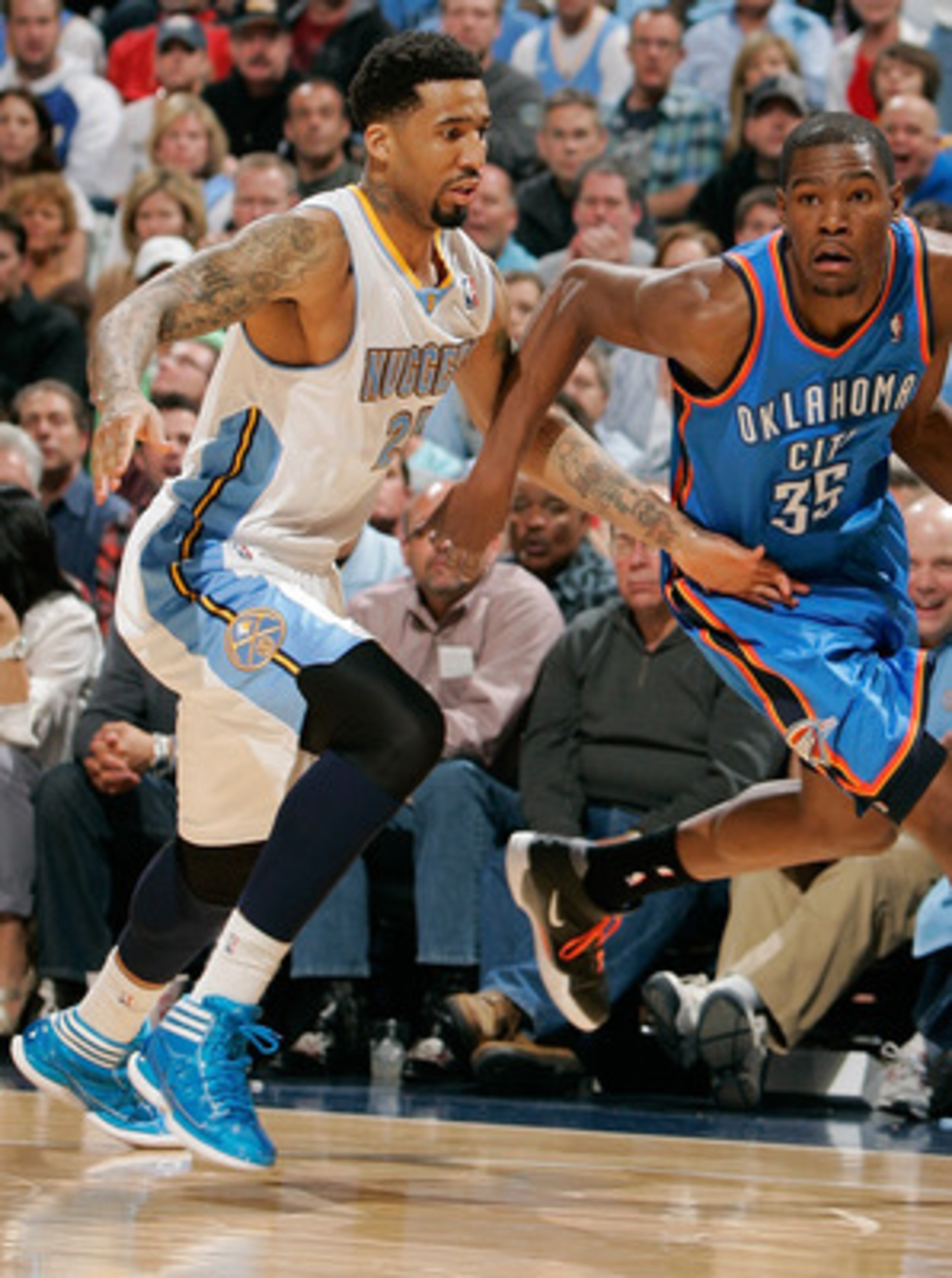 DENVER, CO - APRIL 23:  Kevin Durant #35 of the Oklahoma City Thunder drives to the basket against Wilson Chandler #21 of the Denver Nuggets in Game Three of the Western Conference Quarterfinals in the 2011 NBA Playoffs at Pepsi Center on April 23, 2011 i