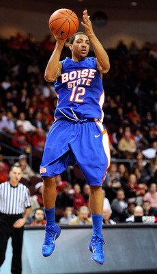 LAS VEGAS, NV - DECEMBER 08:  La'Shard Anderson #12 of the Boise State Broncos looks to pass against the UNLV Rebels during their game at The Orleans Arena December 8, 2010 in Las Vegas, Nevada. UNLV won 75-72.  (Photo by Ethan Miller/Getty Images)