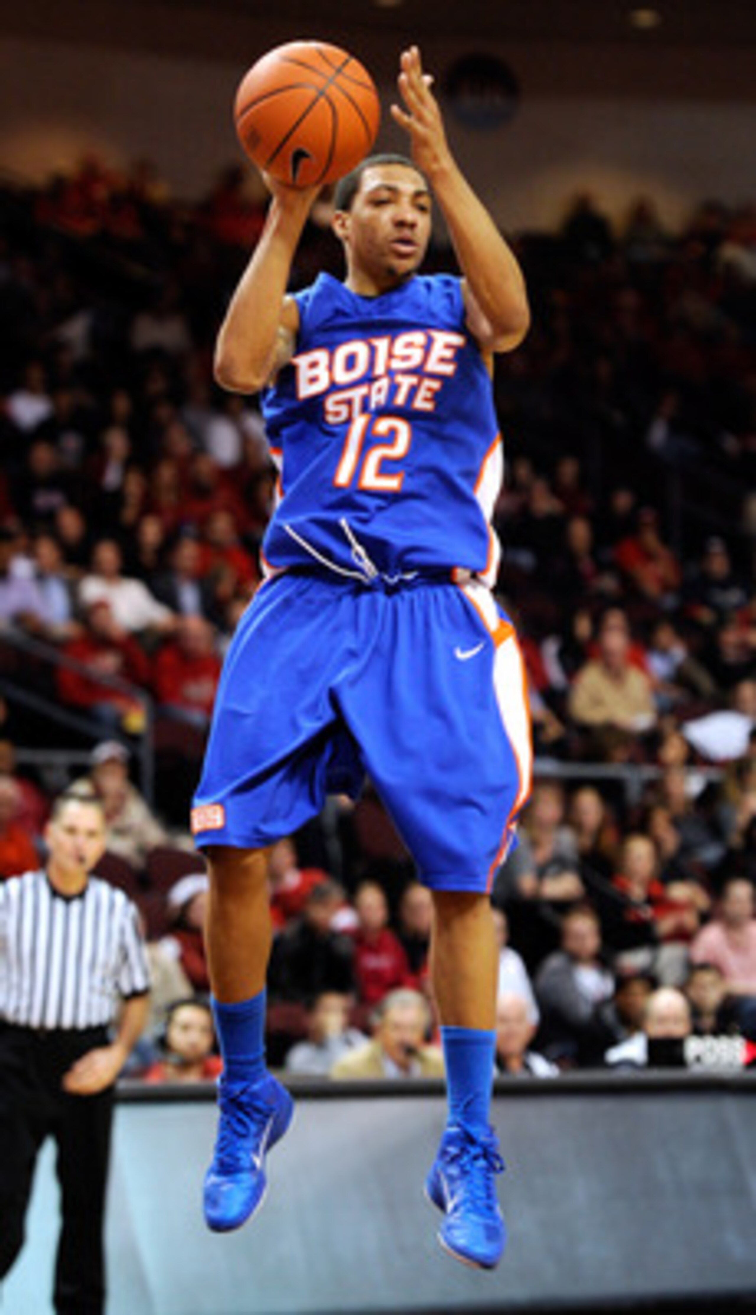LAS VEGAS, NV - DECEMBER 08:  La'Shard Anderson #12 of the Boise State Broncos looks to pass against the UNLV Rebels during their game at The Orleans Arena December 8, 2010 in Las Vegas, Nevada. UNLV won 75-72.  (Photo by Ethan Miller/Getty Images)