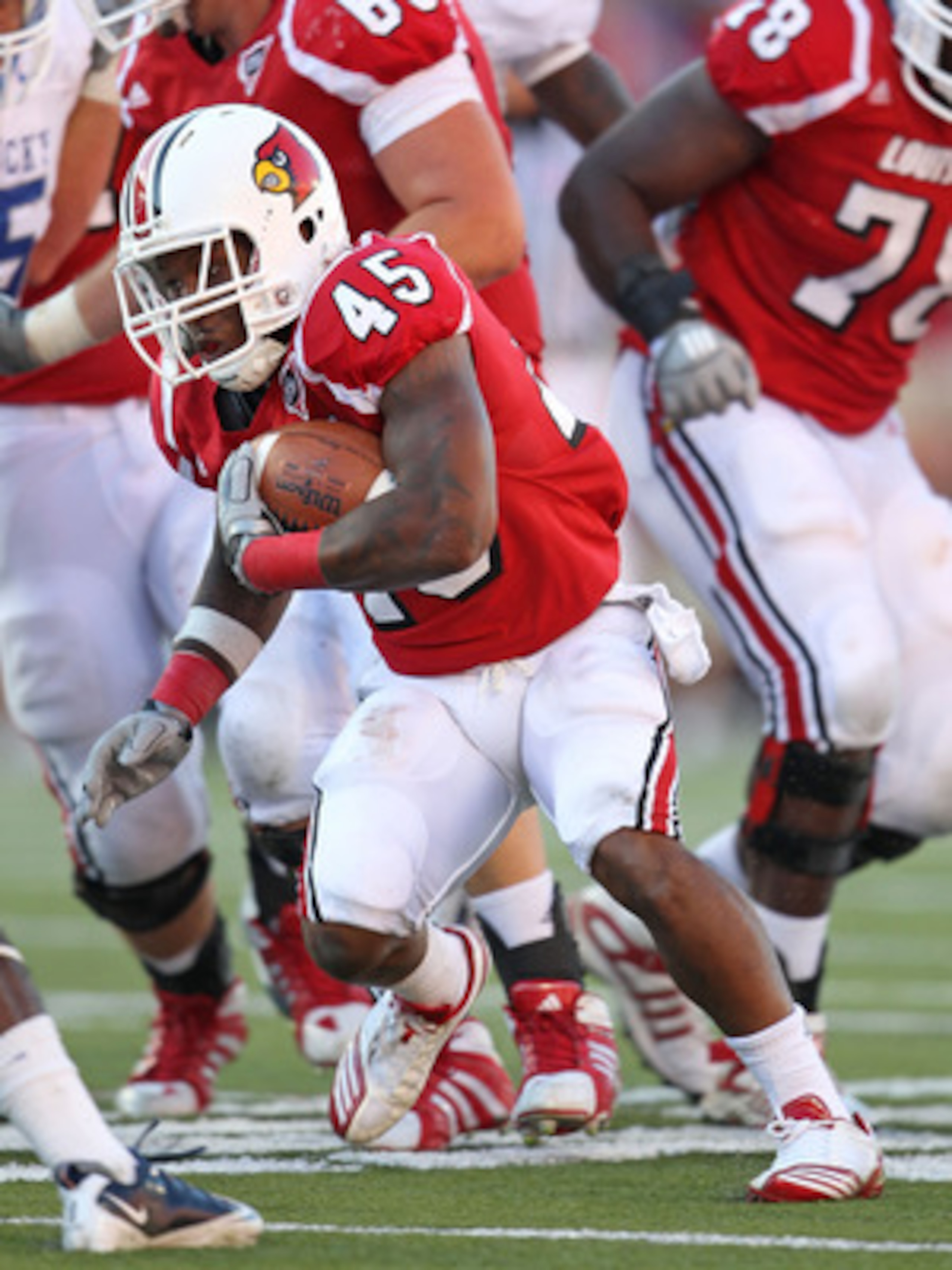 LOUISVILLE, KY - SEPTEMBER 04:  Blayne Donnell #45 of the Louisville Cardinals runs with the ball during the game against the Kentucky Wildcats at Papa John's Cardinal Stadium on September 4, 2010 in Louisville, Kentucky.  (Photo by Andy Lyons/Getty Image