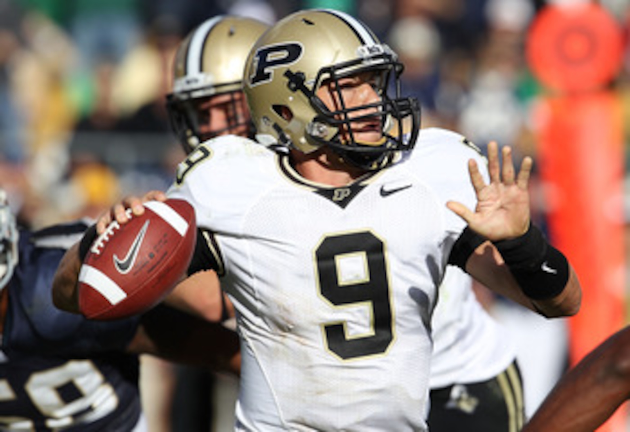 SOUTH BEND, IN - SEPTEMBER 04: Robert Marve #9 of the Purdue Boilermakers throws a pass against the Notre Dame Fighting Irish at Notre Dame Stadium on September 4, 2010 in South Bend, Indiana. Notre Dame defated Purdue 23-12. (Photo by Jonathan Daniel/Get