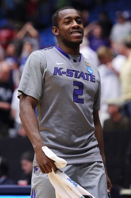 TUCSON, AZ - MARCH 17:  Devon Peterson #2 of the Kansas State Wildcats celebrates after they defeated the Utah State Aggies 73 to 68 in the second round of the 2011 NCAA men's basketball tournament at McKale Center on March 17, 2011 in Tucson, Arizona.  (