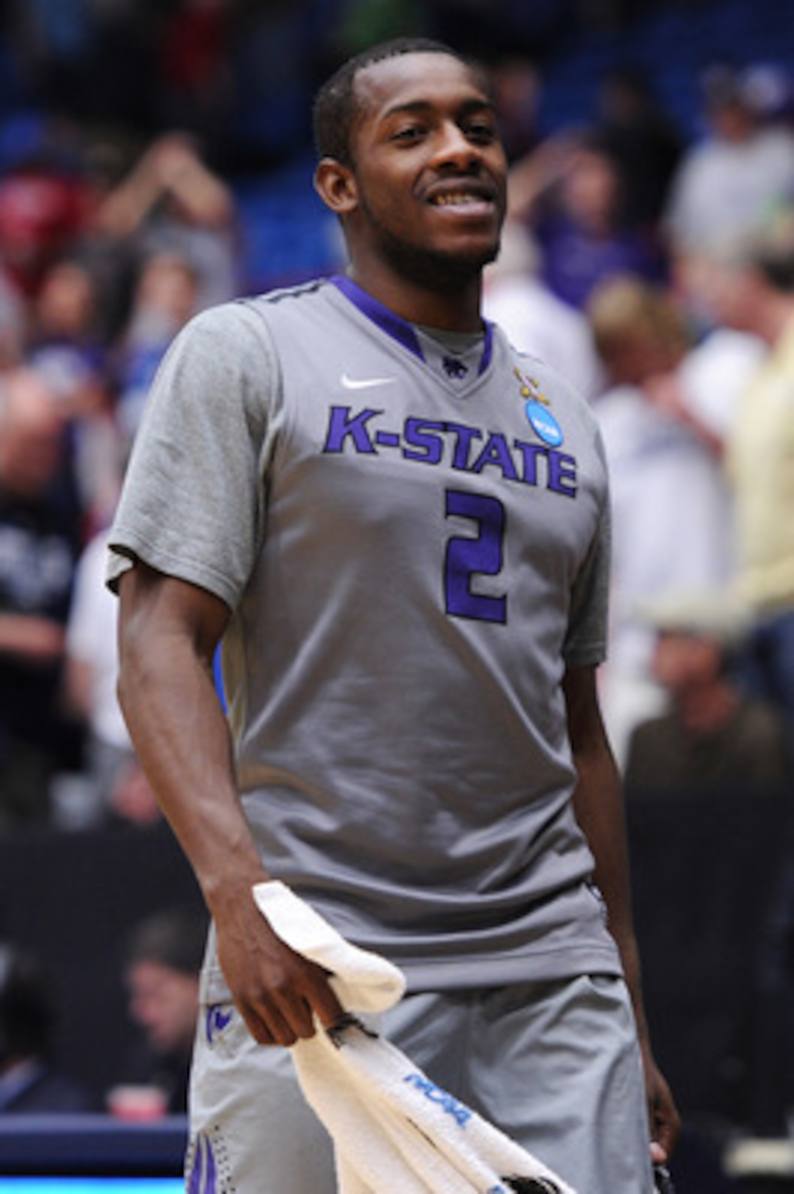 TUCSON, AZ - MARCH 17:  Devon Peterson #2 of the Kansas State Wildcats celebrates after they defeated the Utah State Aggies 73 to 68 in the second round of the 2011 NCAA men's basketball tournament at McKale Center on March 17, 2011 in Tucson, Arizona.  (