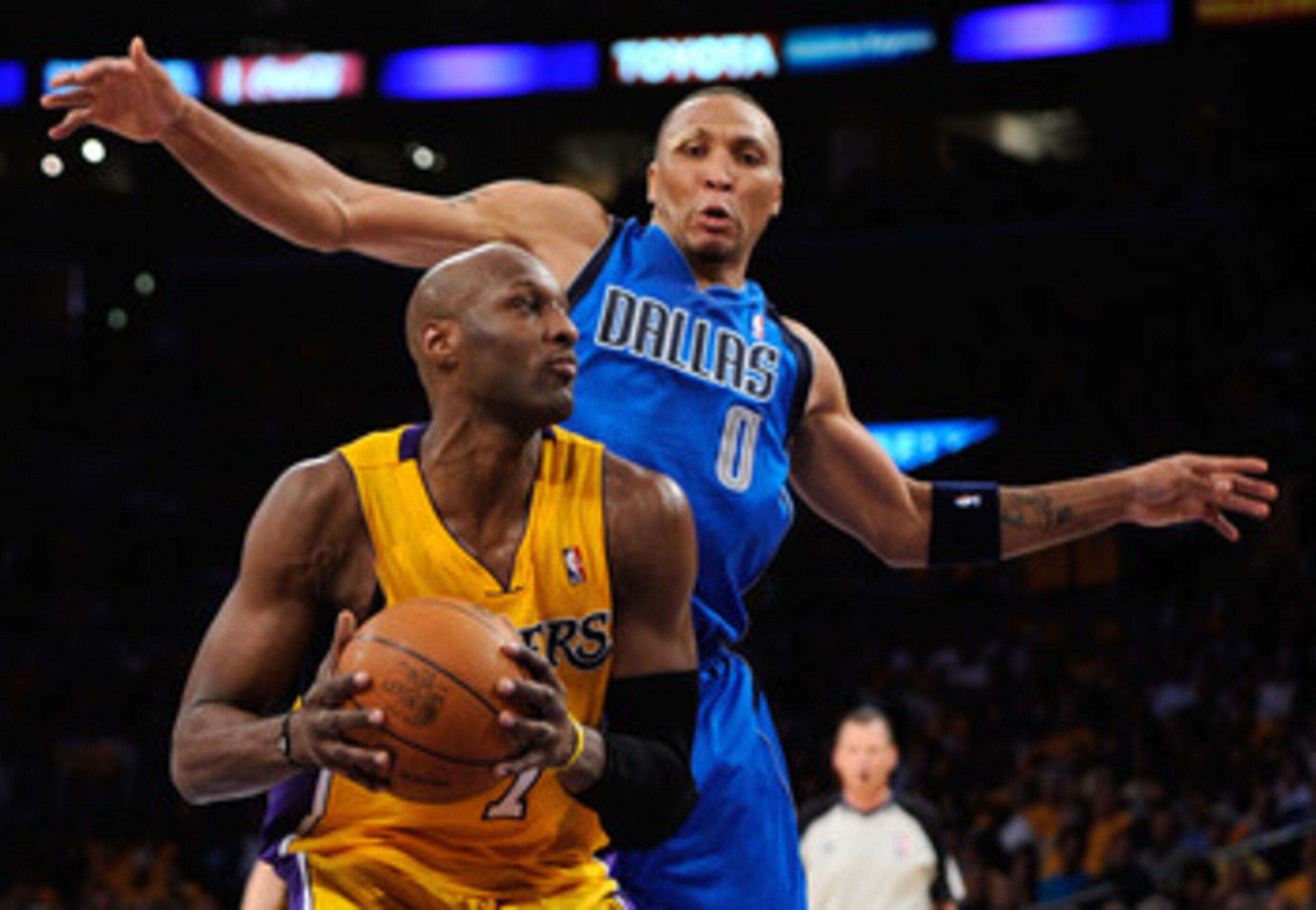 LOS ANGELES, CA - MAY 02:  Lamar Odom #7 of the Los Angeles Lakers drives to the basket as he is guarded by Shawn Marion #0 of the Dallas Mavericks from behind in the second quarter in Game One of the Western Conference Semifinals in the 2011 NBA Playoffs