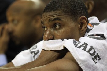 CHARLOTTE, NC - FEBRUARY 14: Andrew Bynum #17 of the Los Angeles Lakers reacts as he sits on the bench during their game against the Charlotte Bobcats at Time Warner Cable Arena on February 14, 2011 in Charlotte, North Carolina. NOTE TO USER: User expres CHARLOTTE, NC - FEBRUARY 14: Andrew Bynum #17 of the Los Angeles Lakers reacts as he sits on the bench during their game against the Charlotte Bobcats at Time Warner Cable Arena on February 14, 2011 in Charlotte, North Carolina. NOTE TO USER: User expres