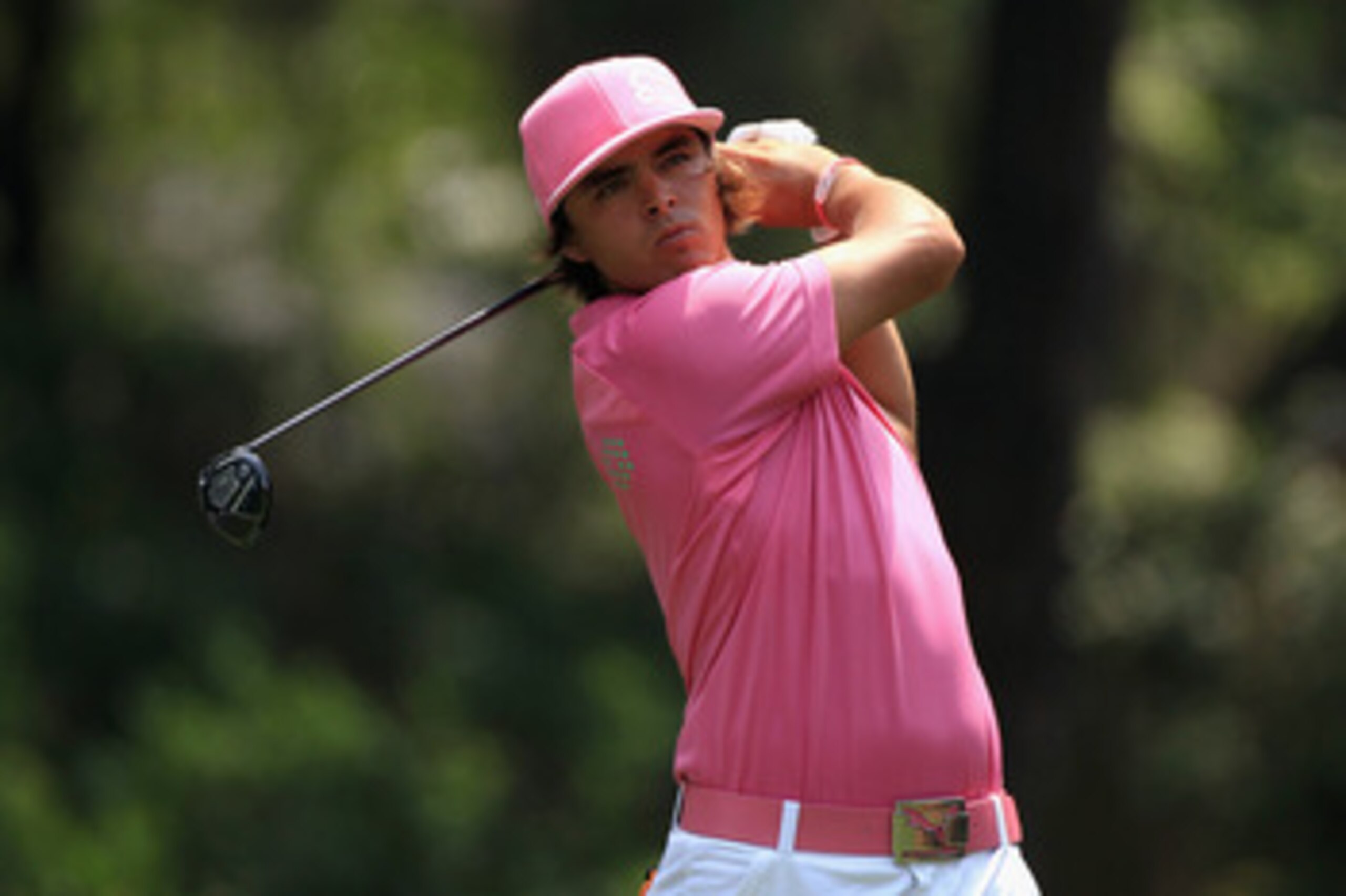 HILTON HEAD ISLAND, SC - APRIL 21:  Rickie Fowler hits his tee shot on the 8th hole during the first round of The Heritage at Harbour Town Golf Links on April 21, 2011 in Hilton Head Island, South Carolina.  (Photo by Streeter Lecka/Getty Images)