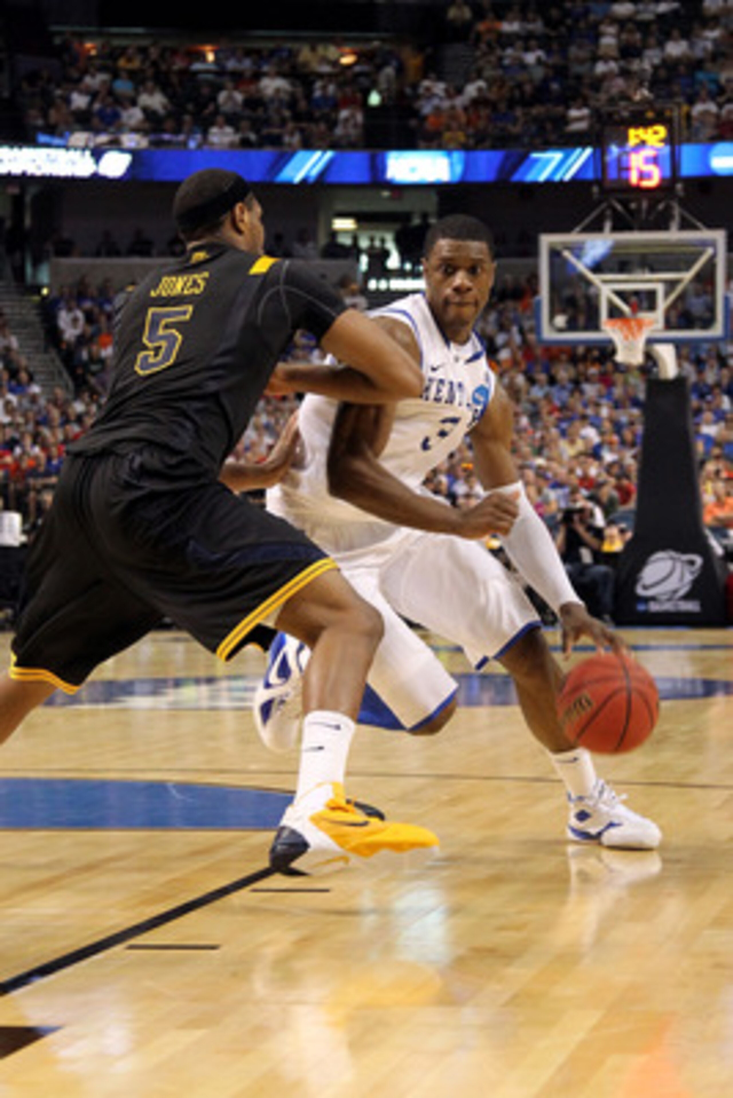 TAMPA, FL - MARCH 19:  Terrence Jones #3 of the Kentucky Wildcats drives against Kevin Jones #5 of the West Virginia Mountaineers during the third round of the 2011 NCAA men's basketball tournament at St. Pete Times Forum on March 19, 2011 in Tampa, Flori