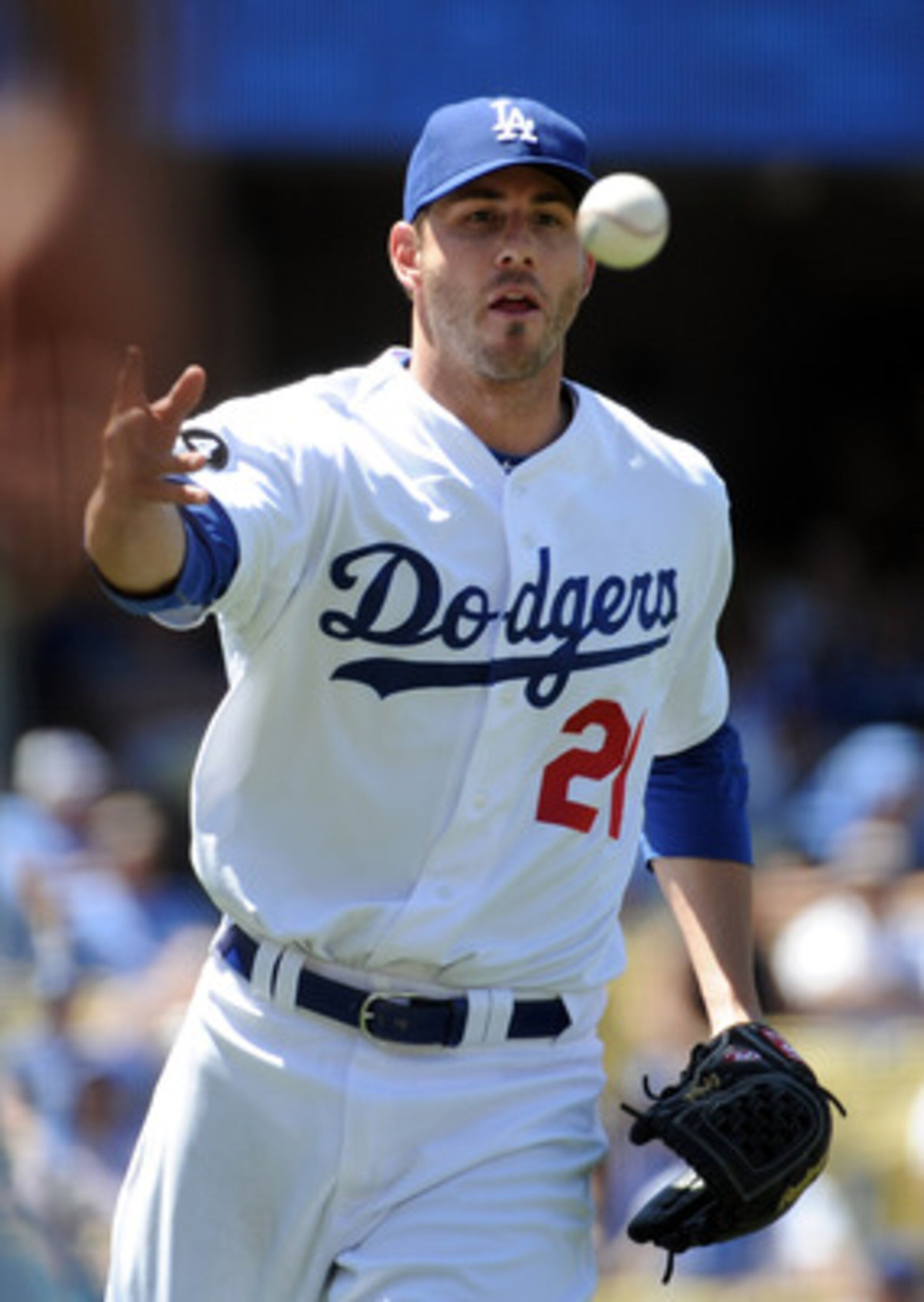 LOS ANGELES, CA - MAY 01:  Jon Garland #21 of the Los Angeles Dodgers tosses to first base for an out in the fourth inning at Dodger Stadium on May 1, 2011 in Los Angeles, California.  (Photo by Harry How/Getty Images)