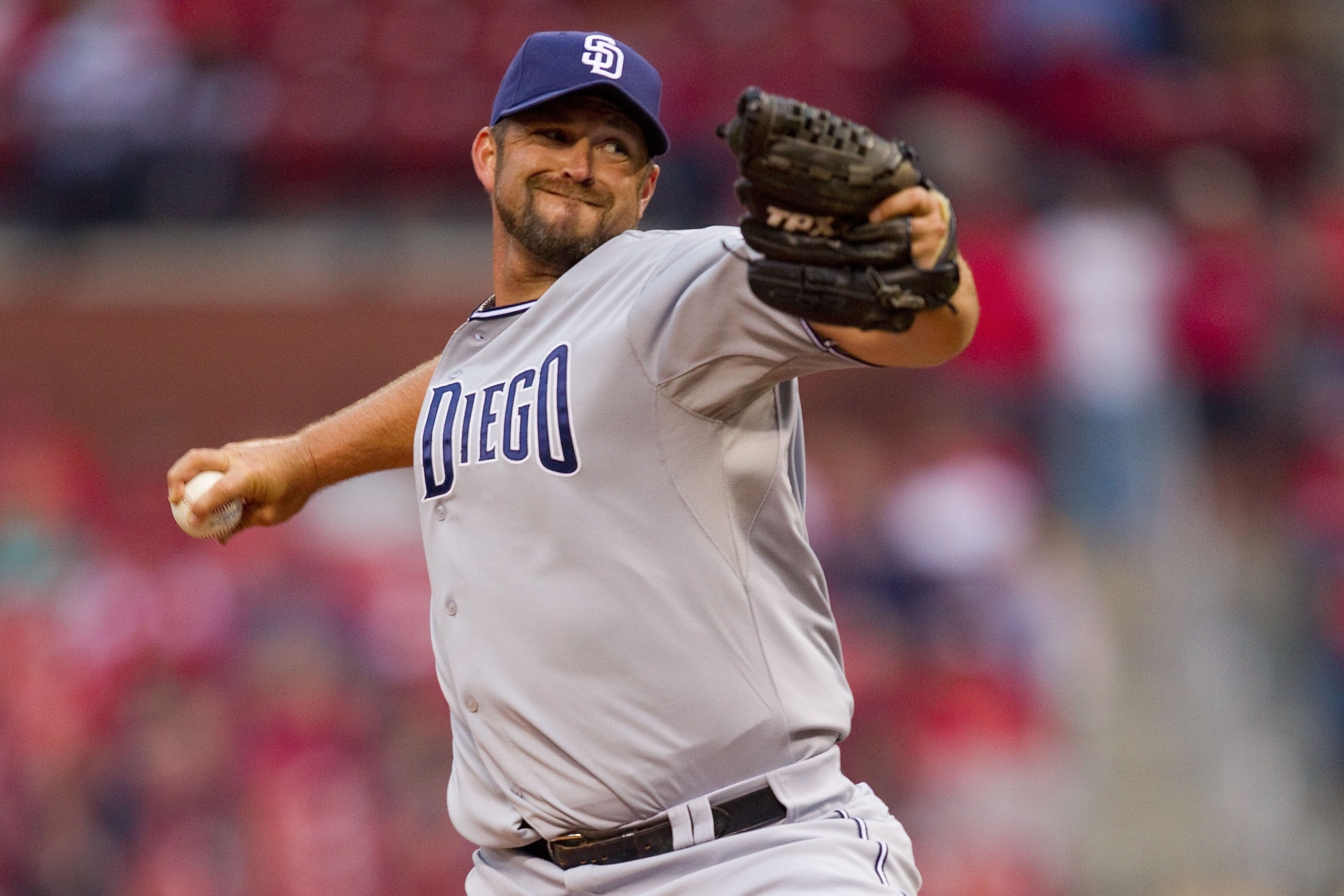 ST. LOUIS, MO - MARCH 31: Reliever Heath Bell #21 of the San Diego Padres pitches against the St. Louis Cardinals on opening day at Busch Stadium on March 31, 2011 in St. Louis, Missouri. (Photo by Dilip Vishwanat/Getty Images) ST. LOUIS, MO - MARCH 31: Reliever Heath Bell #21 of the San Diego Padres pitches against the St. Louis Cardinals on opening day at Busch Stadium on March 31, 2011 in St. Louis, Missouri. (Photo by Dilip Vishwanat/Getty Images)