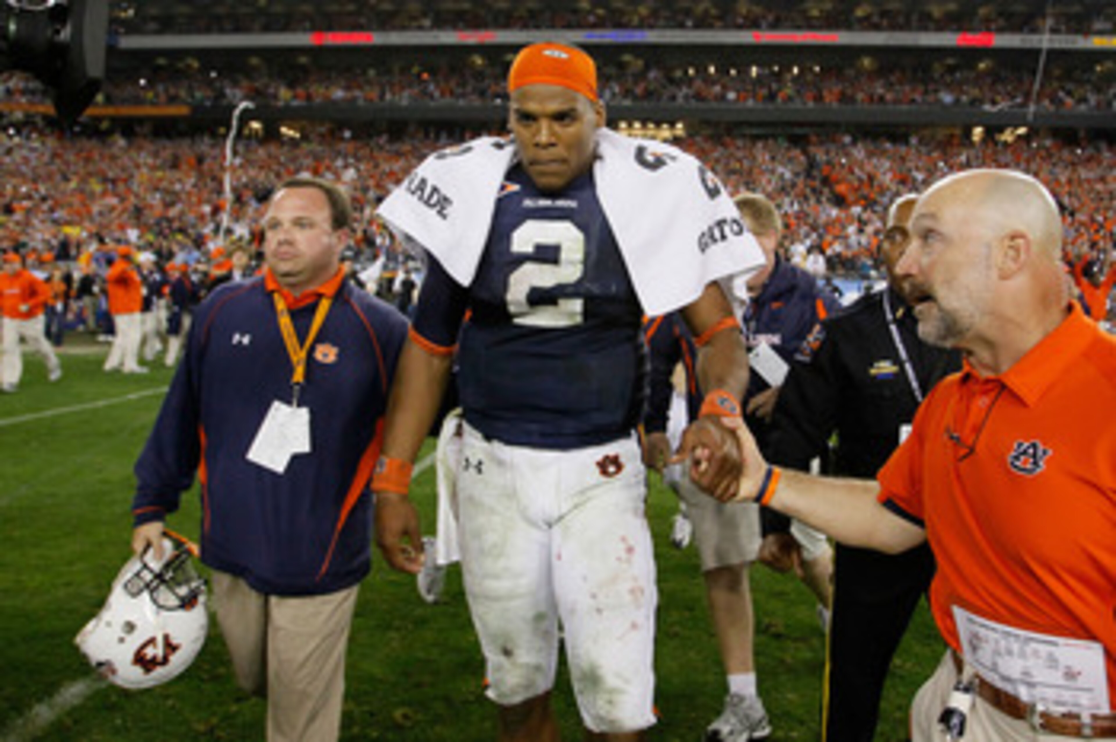 GLENDALE, AZ - JANUARY 10:  Quarterback Cameron Newton #2 of the Auburn Tigers celebrates the Tigers 22-19 victory against the Oregon Ducks in the Tostitos BCS National Championship Game at University of Phoenix Stadium on January 10, 2011 in Glendale, Ar