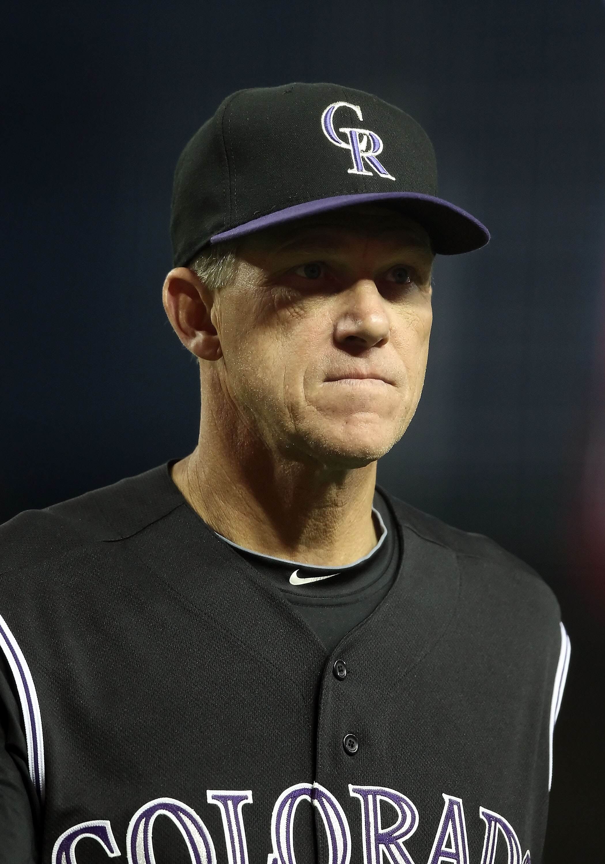 PHOENIX, AZ - MAY 03:  Manager Jim Tracy of the Colorado Rockies walks back to the dugout after a visit to the mound during the Major League Baseball game against the Arizona Diamondbacks at Chase Field on May 3, 2011 in Phoenix, Arizona.  (Photo by Chris