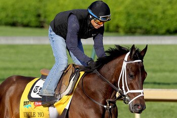LOUISVILLE, KY - APRIL 29:  Uncle Mo runs during the morning exercise session in preparation for the 137th Kentucky Derby at Churchill Downs on April 29, 2011 in Louisville, Kentucky.  (Photo by Matthew Stockman/Getty Images)