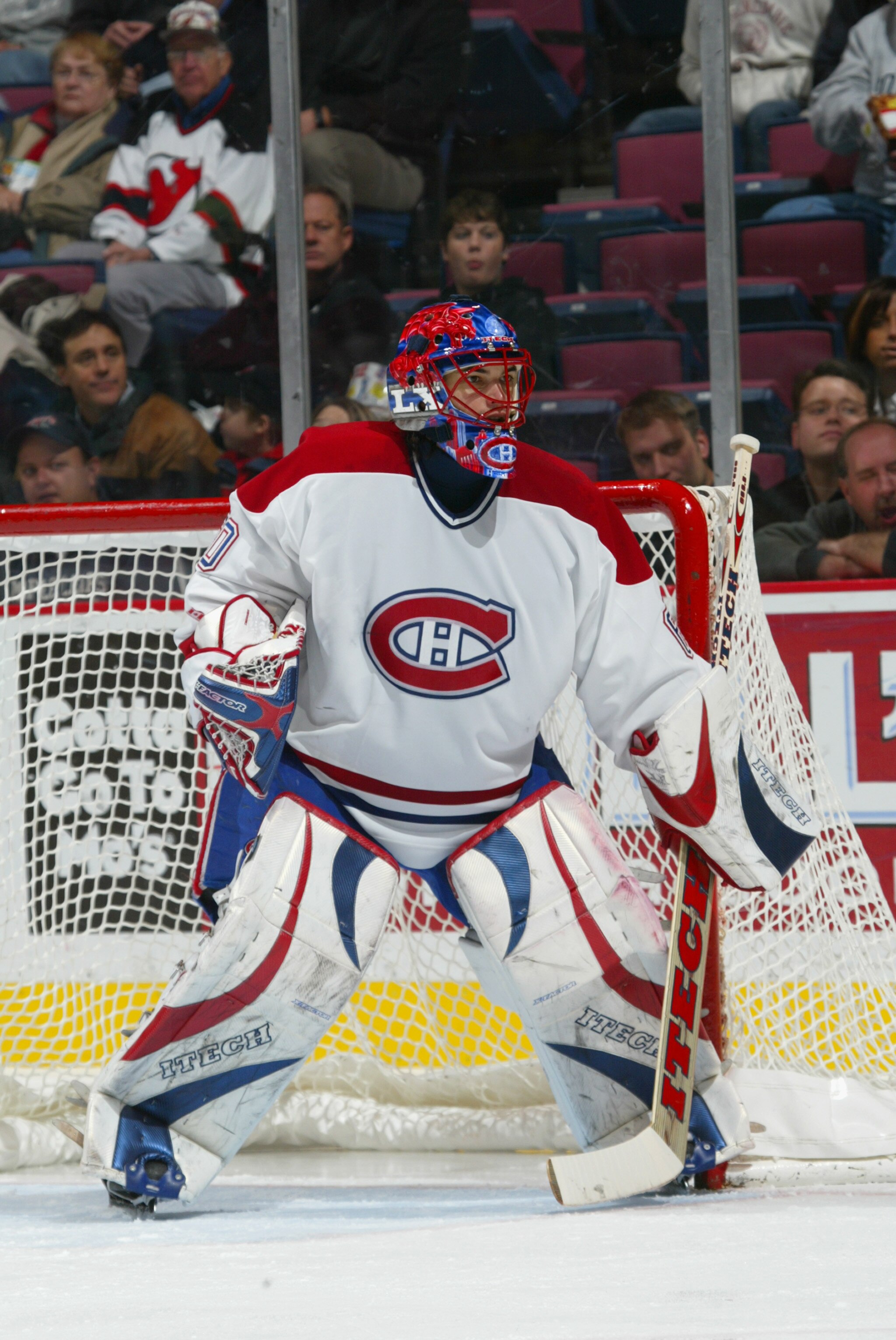 EAST RUTHERFORD, NJ - NOVEMBER 18:  Goalie Jose Theodore #60 of the Montreal Canadians is on the ice during the game against the New Jersey Devils at the Continental Airlines Arena on November 18, 2005 in East Rutherford, New Jersey.  The Devils won 5-3.