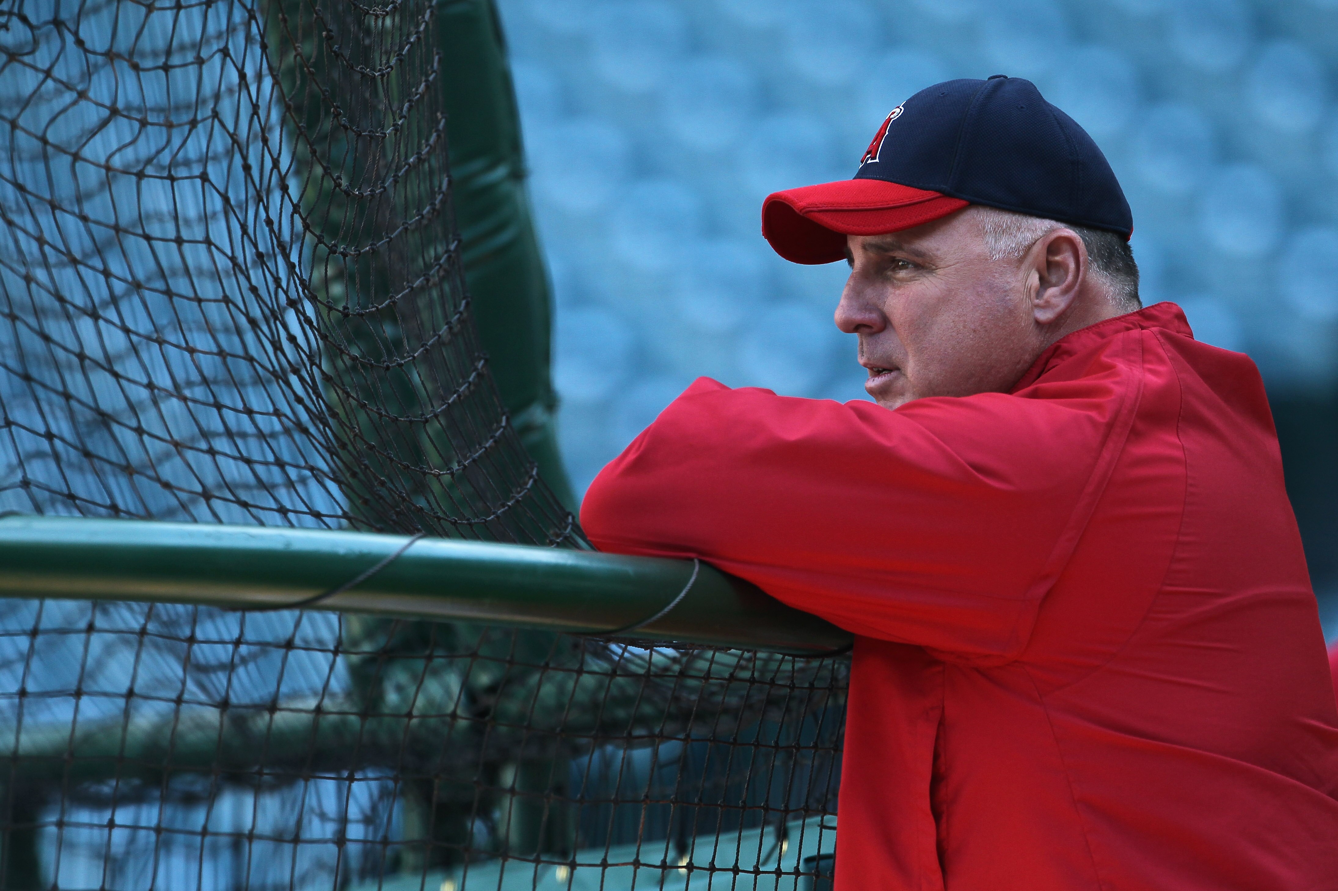 ANAHEIM, CA - APRIL 08:  Los Angeles Angels of Anaheim manager Mike Scioscia watches his team take batting practice prior to the start of the game against the Toronto Blue Jays at Angel Stadium of Anaheim on April 8, 2011 in Anaheim, California. The Blue
