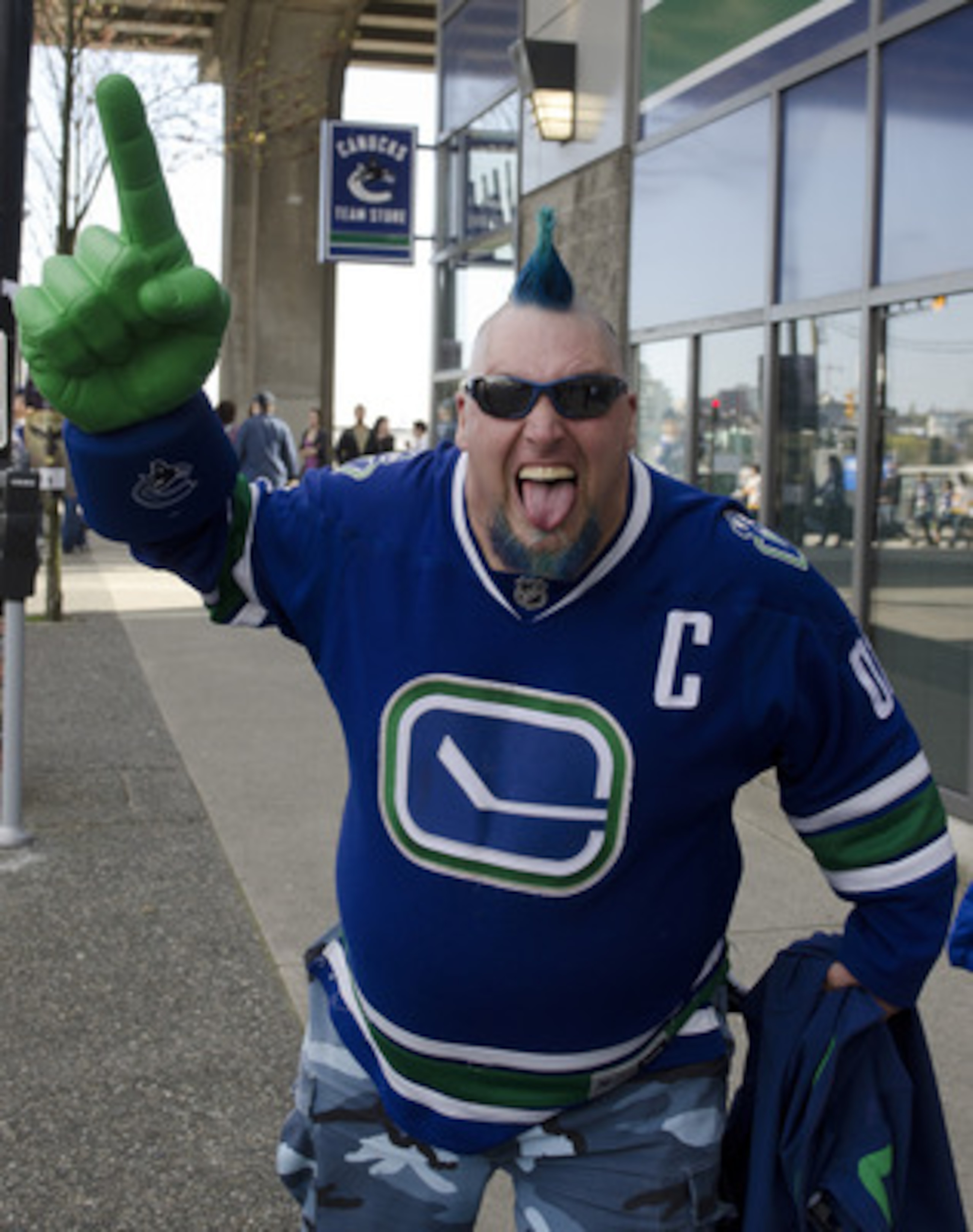 VANCOUVER, CANADA - APRIL 30: A Vancouver Canucks fan takes part in pre game celebrations outside Rogers Arena prior to the start of Game Two of the Western Conference Semifinals between the Vancouver Canucks and Nashville Predators during the 2011 NHL St VANCOUVER, CANADA - APRIL 30: A Vancouver Canucks fan takes part in pre game celebrations outside Rogers Arena prior to the start of Game Two of the Western Conference Semifinals between the Vancouver Canucks and Nashville Predators during the 2011 NHL St