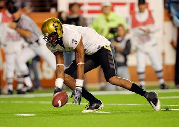 AUSTIN, TX - OCTOBER 10: Cornerback Jimmy Smith #3 of the Colorado Buffaloes picks up the loose ball which was knocked out of the hand of quarterback Colt McCoy of the Texas Longhorns as he rolled out in the second quarter on October 10, 2009 at Darrell K