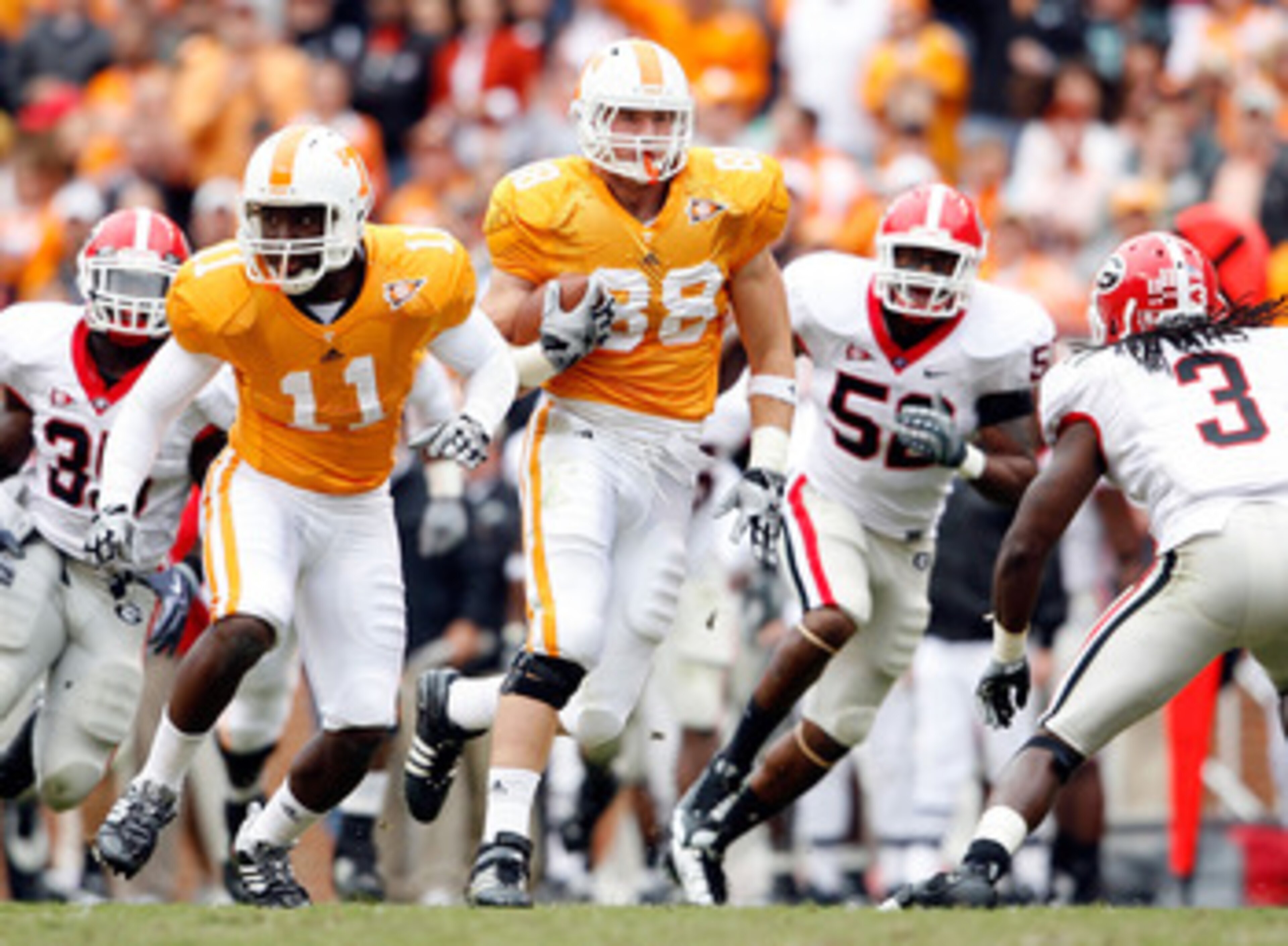 KNOXVILLE, TN - OCTOBER 10: Luke Stocker #88 of the Tennessee Volunteers runs with the ball after a reception during the SEC game against the Georgia Bulldogs at Neyland Stadium on October 10, 2009 in Knoxville, Tennessee. (Photo by Andy Lyons/Getty Image