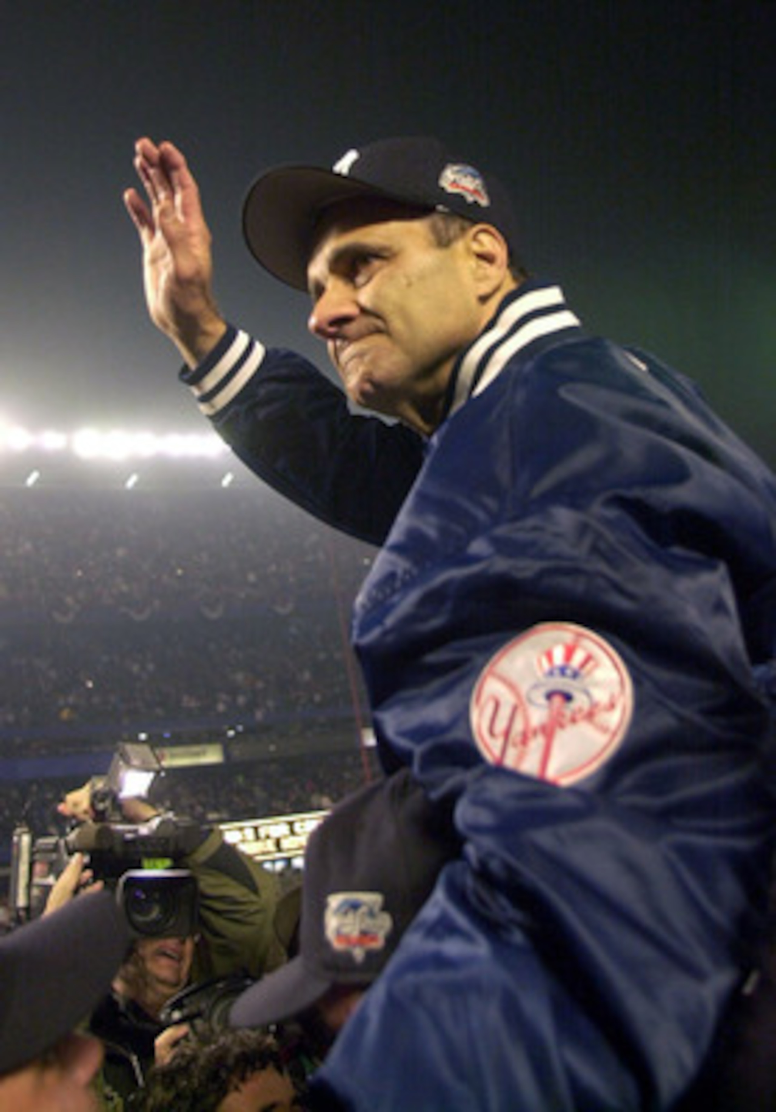 FLUSHING, NY - OCTOBER 26: (FILE PHOTO) Manager Joe Torre of the New York Yankees celebrates their 4-2 win and World Series Championship over the New York Mets in five games during the World Series October 26, 2000 at Shea Stadium in Flushing, New York.