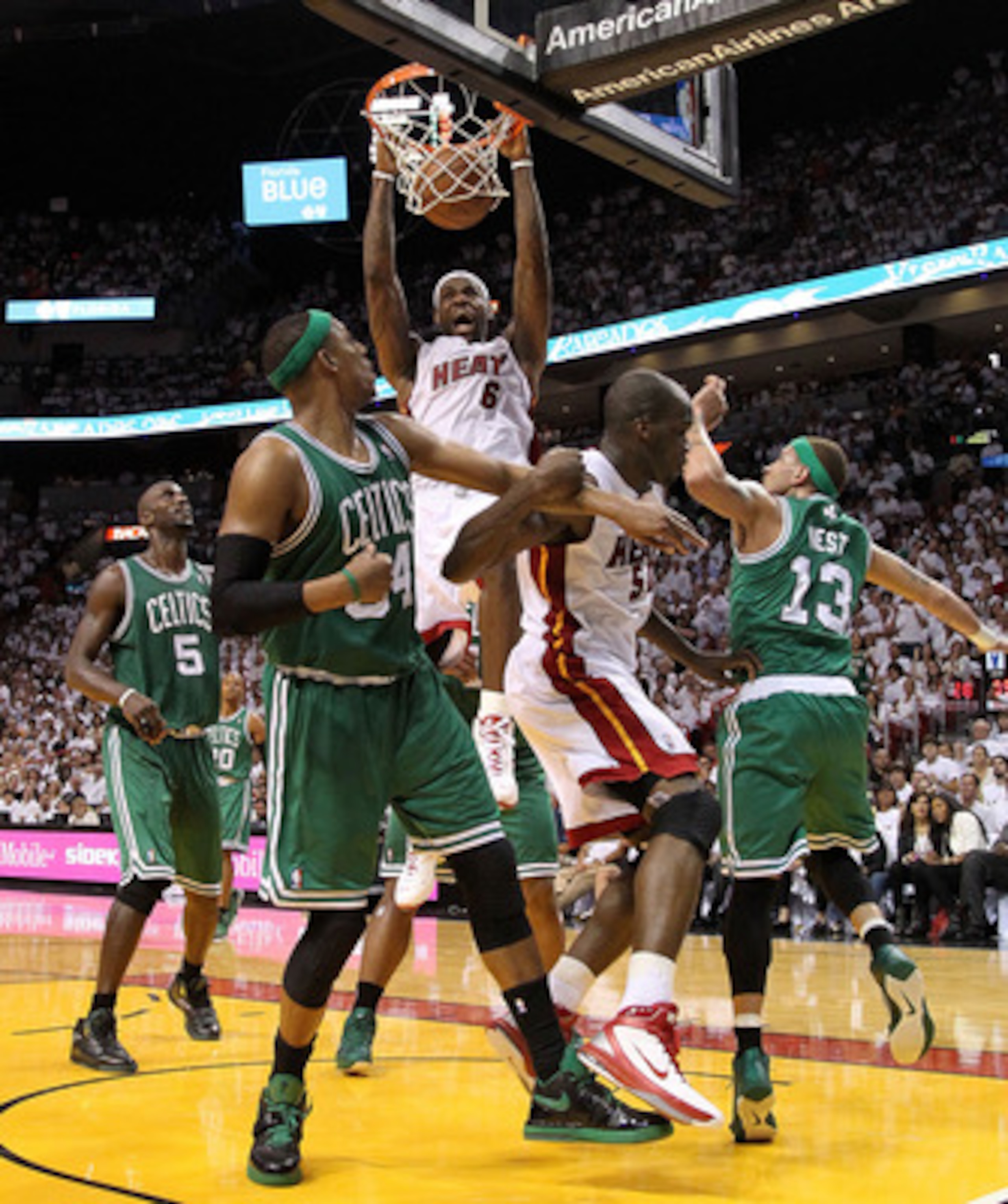 MIAMI, FL - MAY 03: LeBron James #6 of the Miami Heat dunks over Paul Pierce #34 and Delonte West #13 of the Boston Celtics during Game Two of the Eastern Conference Semifinals of the 2011 NBA Playoffs at American Airlines Arena on May 3, 2011 in Miami, MIAMI, FL - MAY 03: LeBron James #6 of the Miami Heat dunks over Paul Pierce #34 and Delonte West #13 of the Boston Celtics during Game Two of the Eastern Conference Semifinals of the 2011 NBA Playoffs at American Airlines Arena on May 3, 2011 in Miami,
