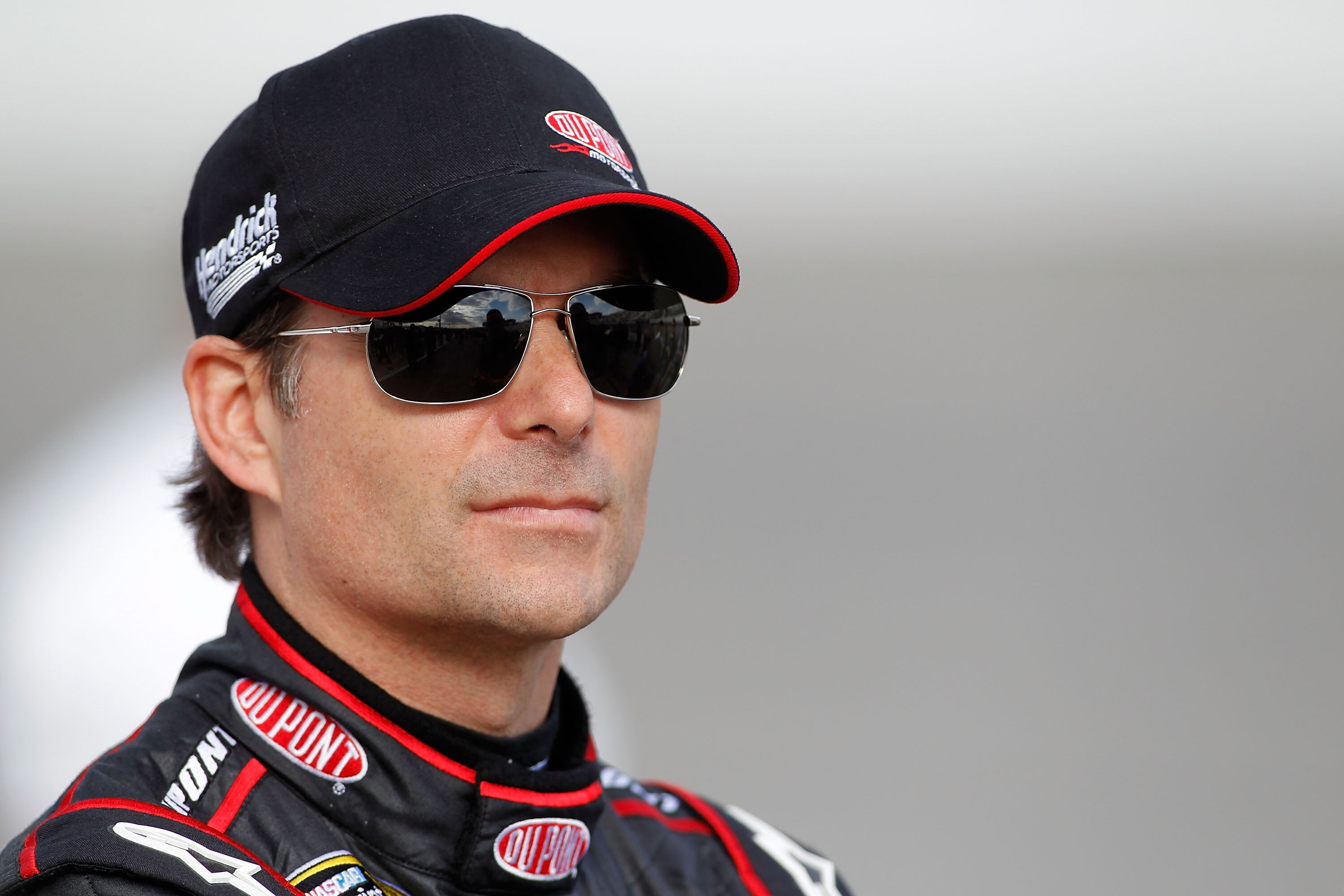 RICHMOND, VA - APRIL 29:  Jeff Gordon, driver of the #24 DuPont Chevrolet, stands on pit road during qualifying for the NASCAR Sprint Cup Series Crown Royal Presents The Matthew & Daniel Hansen 400 at Richmond International Raceway on April 29, 2011 in Ri