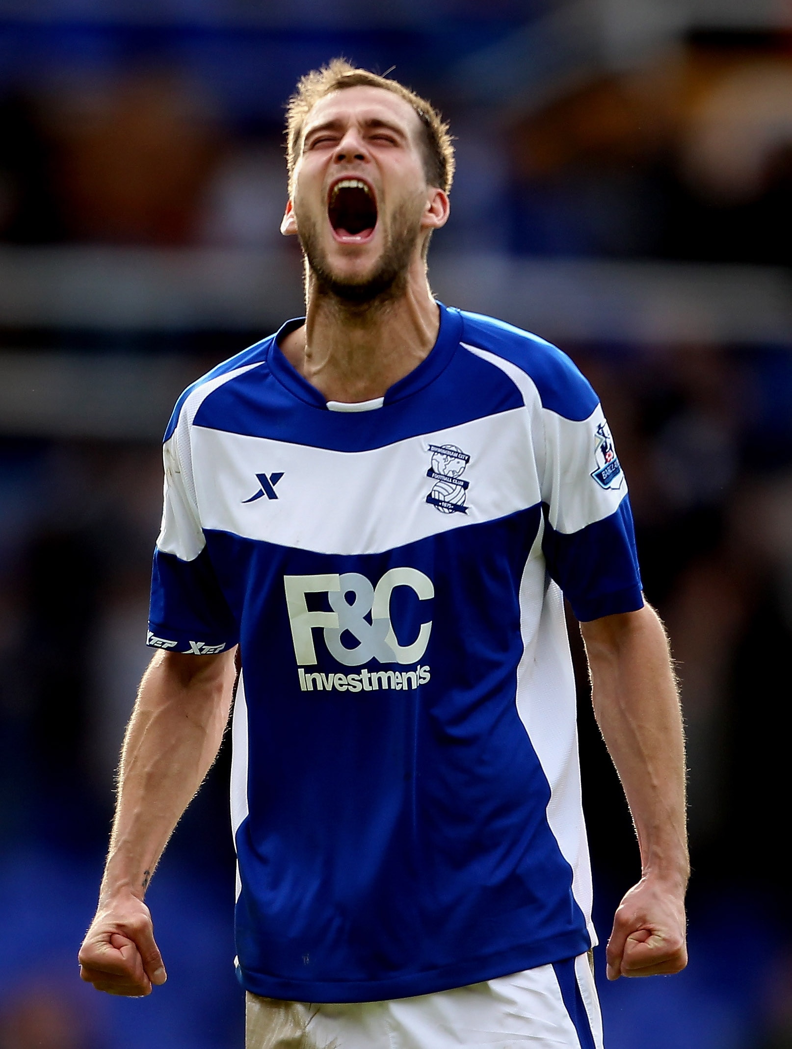 BIRMINGHAM, ENGLAND - APRIL 02:  Roger Johnson of Birmingham celebrates after the victory during the Barclays Premier League match between Birmingham City and Bolton Wanderers at St.Andrews, on April 2, 2011 in Birmingham, England.  (Photo by Scott Heavey