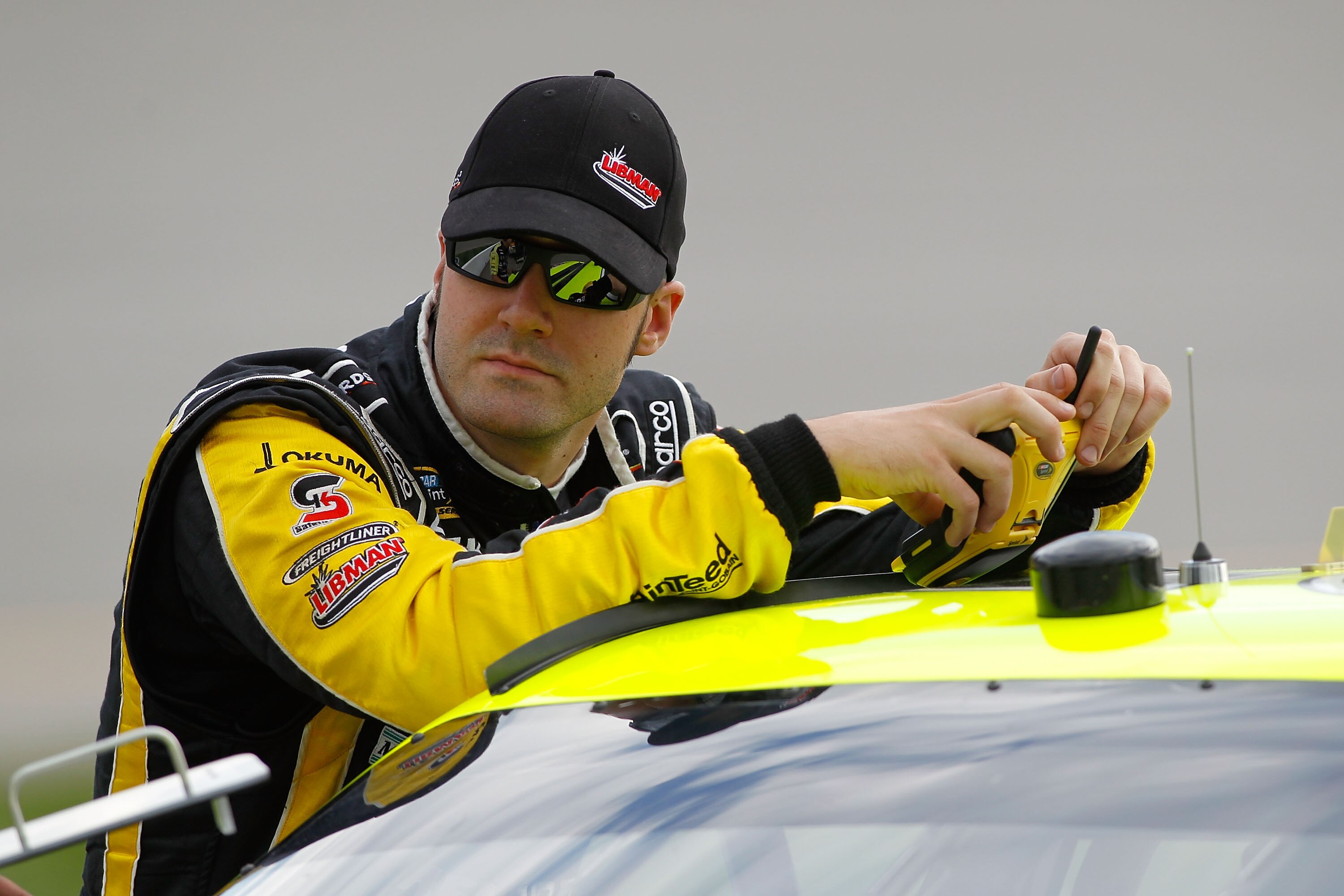 RICHMOND, VA - APRIL 29:  Paul Menard, driver of the #27 Libman/Menards Chevrolet, looks on during qualifying for the NASCAR Sprint Cup Series Crown Royal Presents The Matthew & Daniel Hansen 400 at Richmond International Raceway on April 29, 2011 in Rich