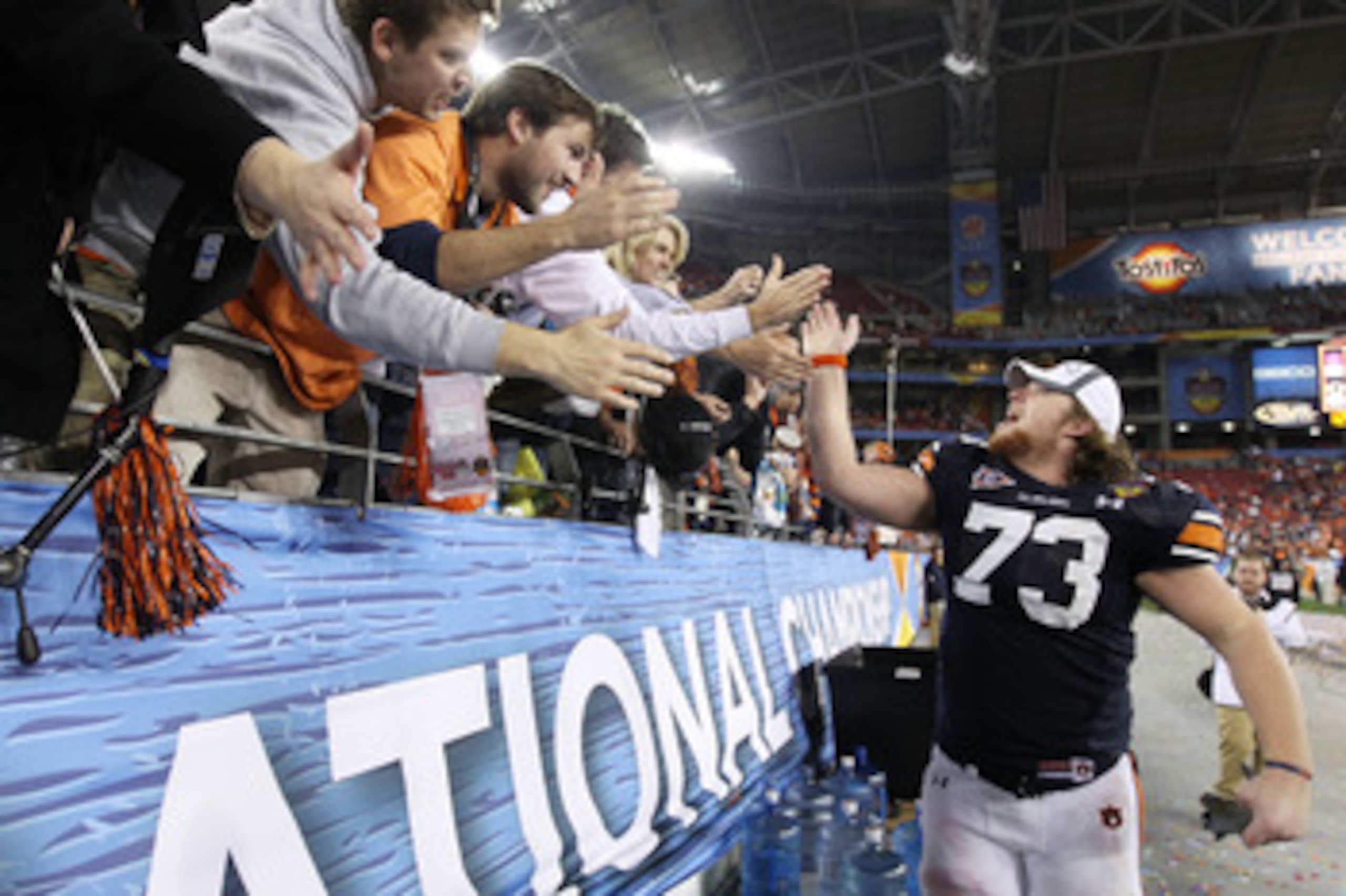GLENDALE, AZ - JANUARY 10:  Lee Ziemba #73 of the Auburn Tigers celebrates their 22-19 victory after defeating the Oregon Ducks in the Tostitos BCS National Championship Game at University of Phoenix Stadium on January 10, 2011 in Glendale, Arizona.  (Pho