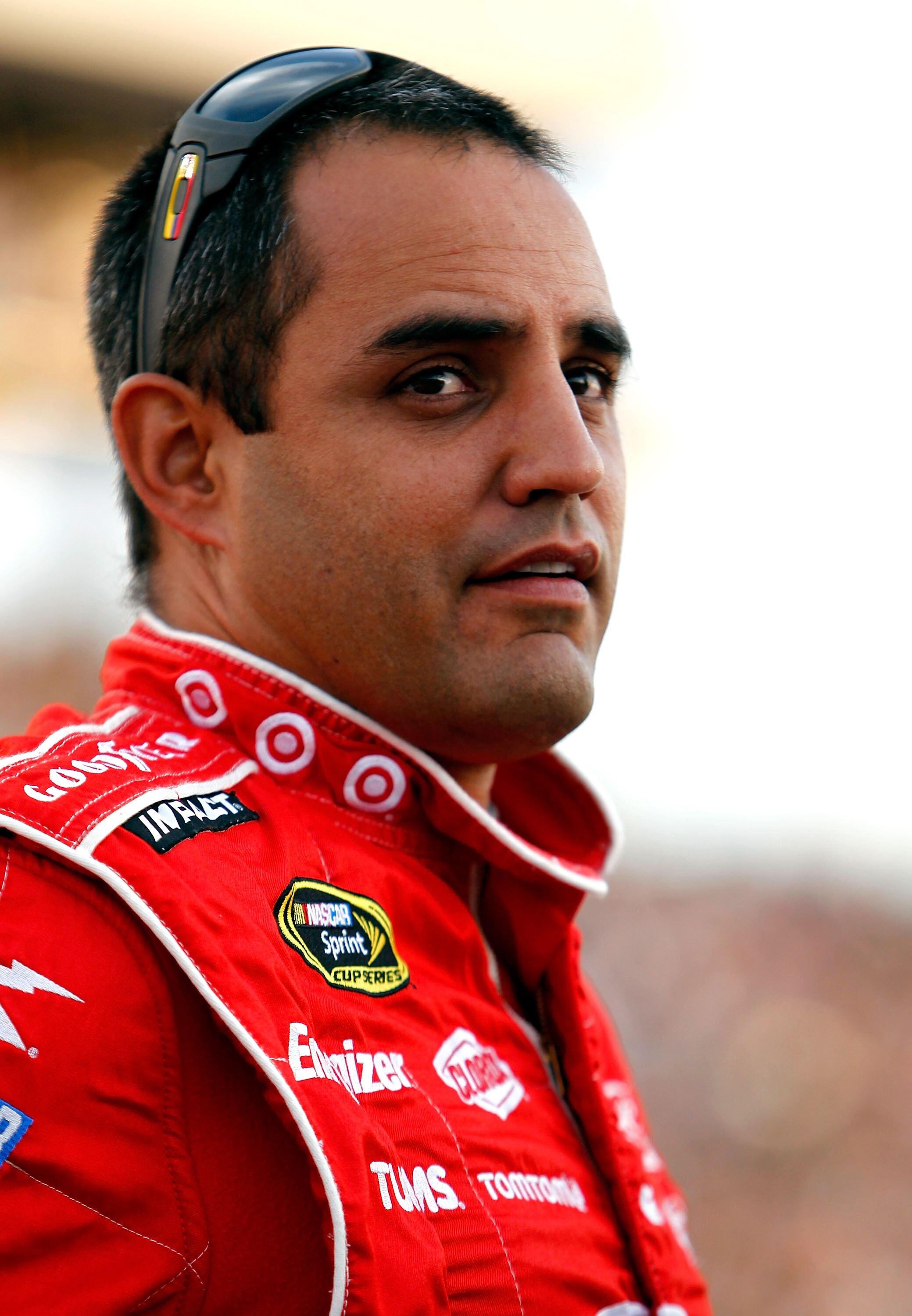 RICHMOND, VA - APRIL 30:  Juan Pablo Montoya. driver of the #42 Target Chevrolet stands in the grid before the NASCAR Sprint Cup Series Crown Royal Presents The Matthew & Daniel Hansen 400 at Richmond International Raceway on April 30, 2011 in Richmond, V