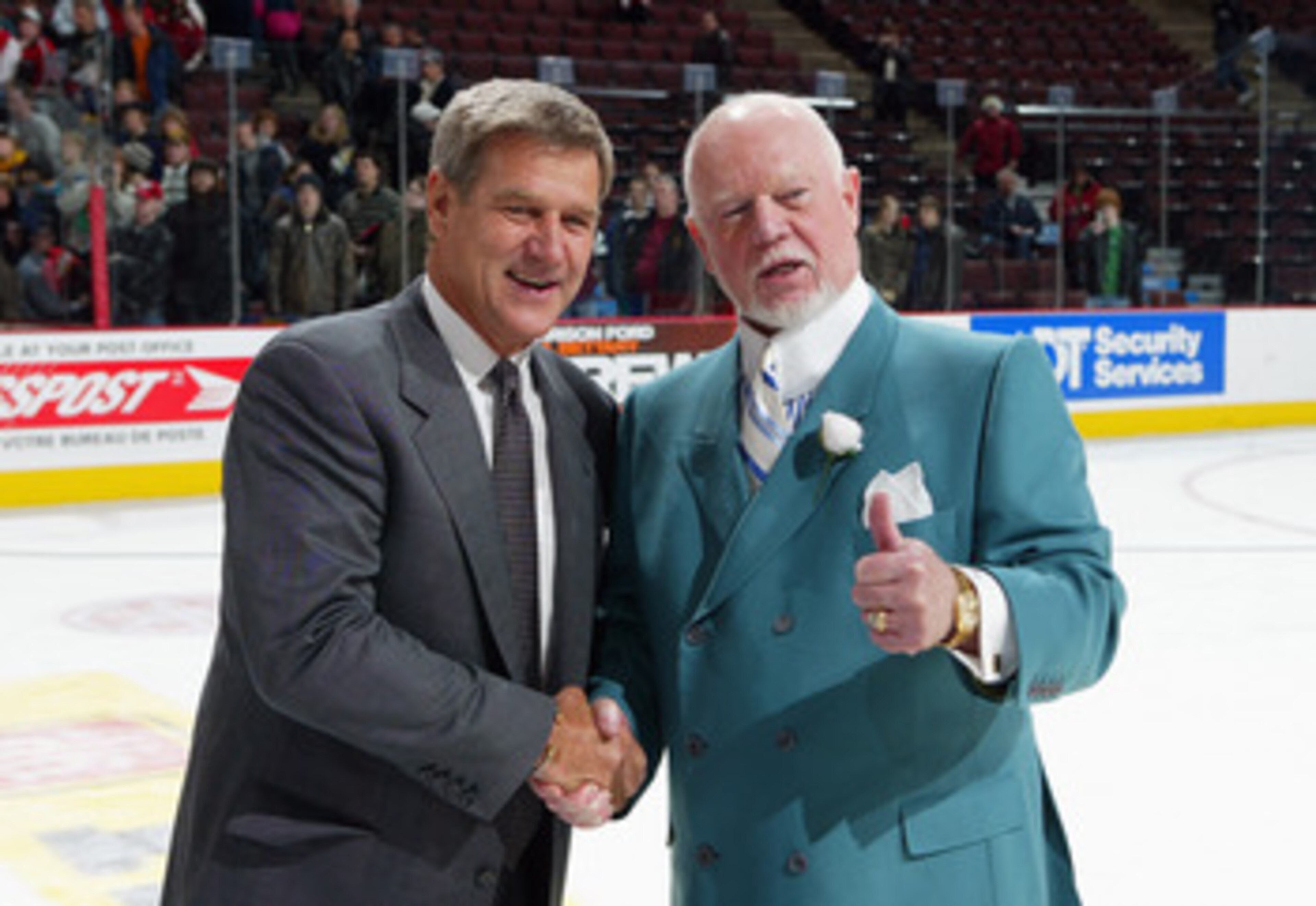 OTTAWA - JANUARY 18:  Head coach Bobby Orr (L) of Team Orr smiles and head coach Don Cherry of Team Cherry shake hands after Orr's team won the CHL Top Prospects game 7-2 at Scotiabank Place January 18, 2006 in Ottawa, Ontario, Canada. (Photo by Dave Sand