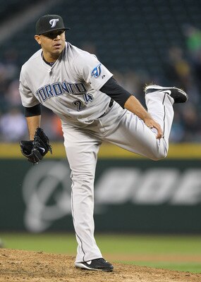 SEATTLE, WA - APRIL 12:  Starting pitcher Ricky Romero #24 of the Toronto Blue Jays pitches against the Seattle Mariners at Safeco Field on April 12, 2011 in Seattle, Washington. (Photo by Otto Greule Jr/Getty Images)
